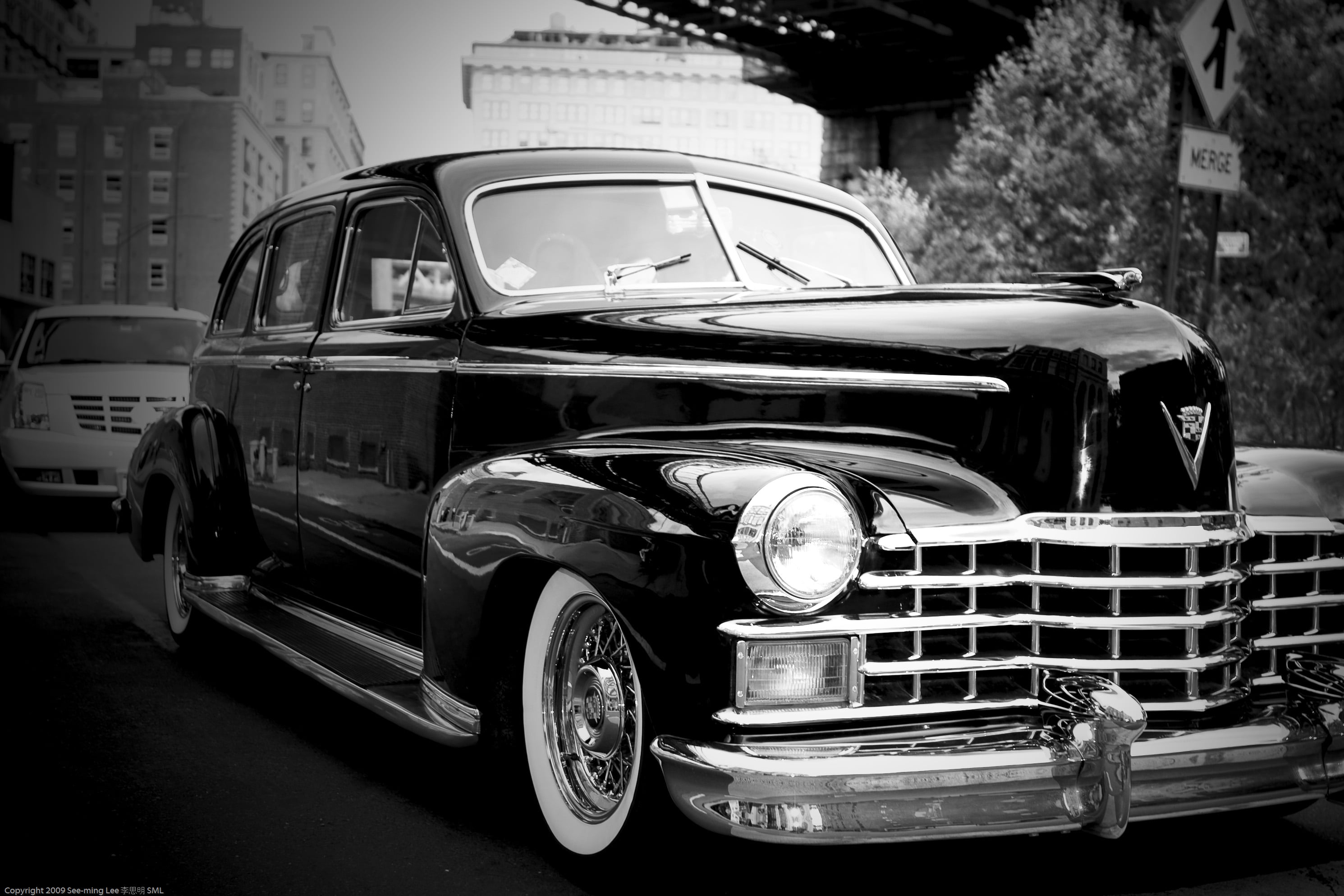 Grayscale photography of classic car on road beside street sign HD ...