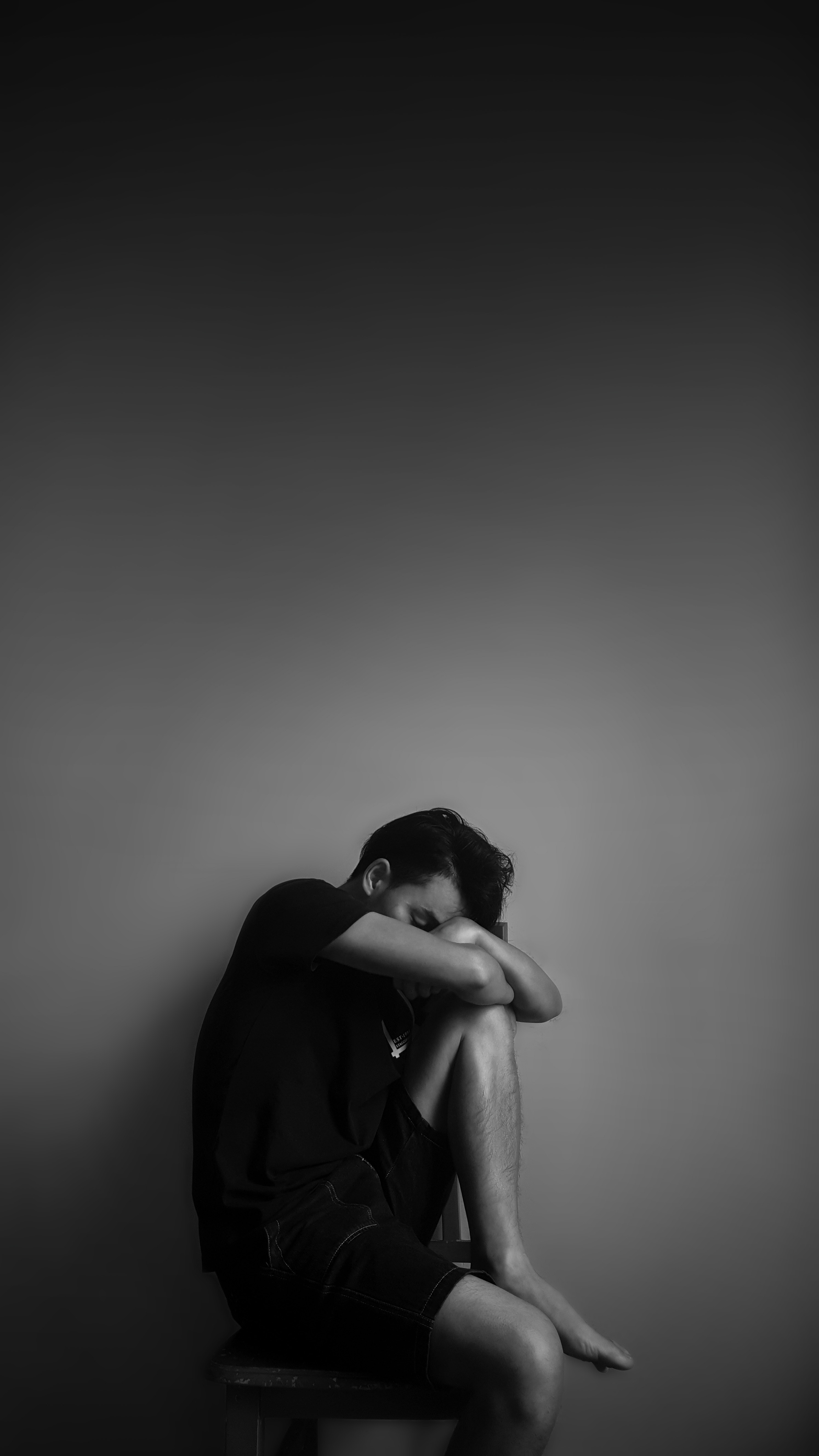 Grayscale Photography of Man Sitting Beside Wall, Adult, Man, Side view, Sad, HQ Photo