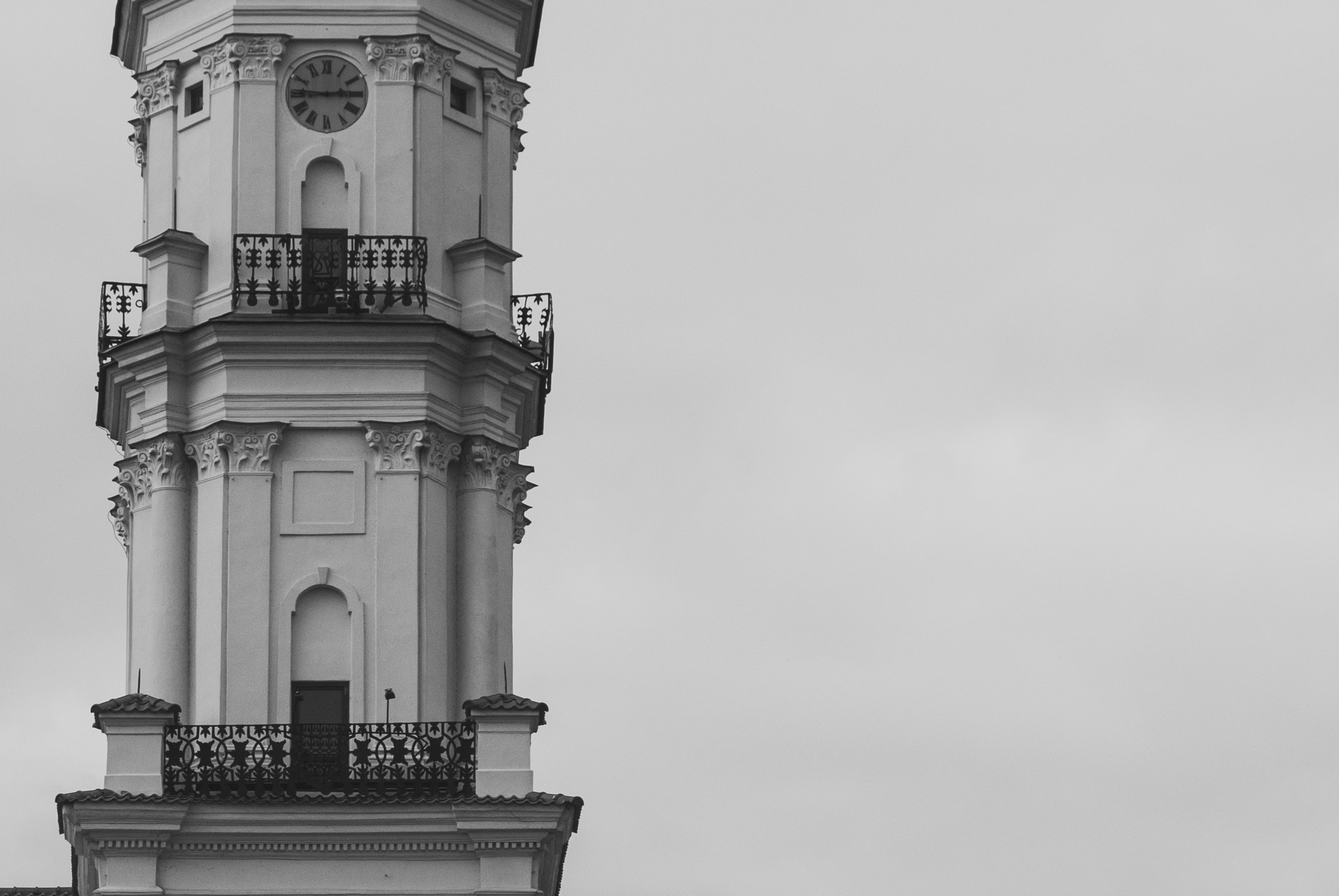 Grayscale photography of tower during daytime