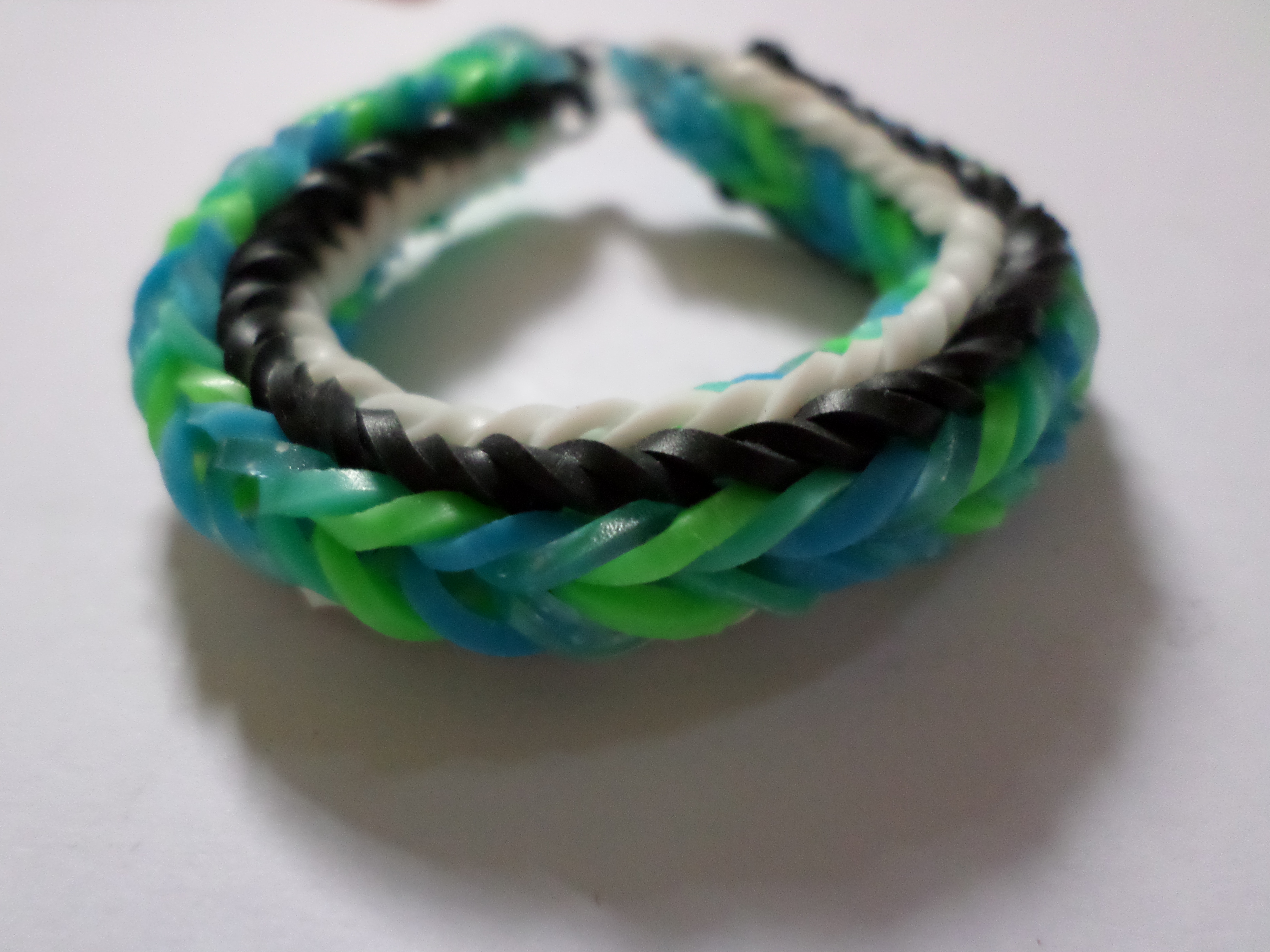 Green, blue, black and white loom bracel photo