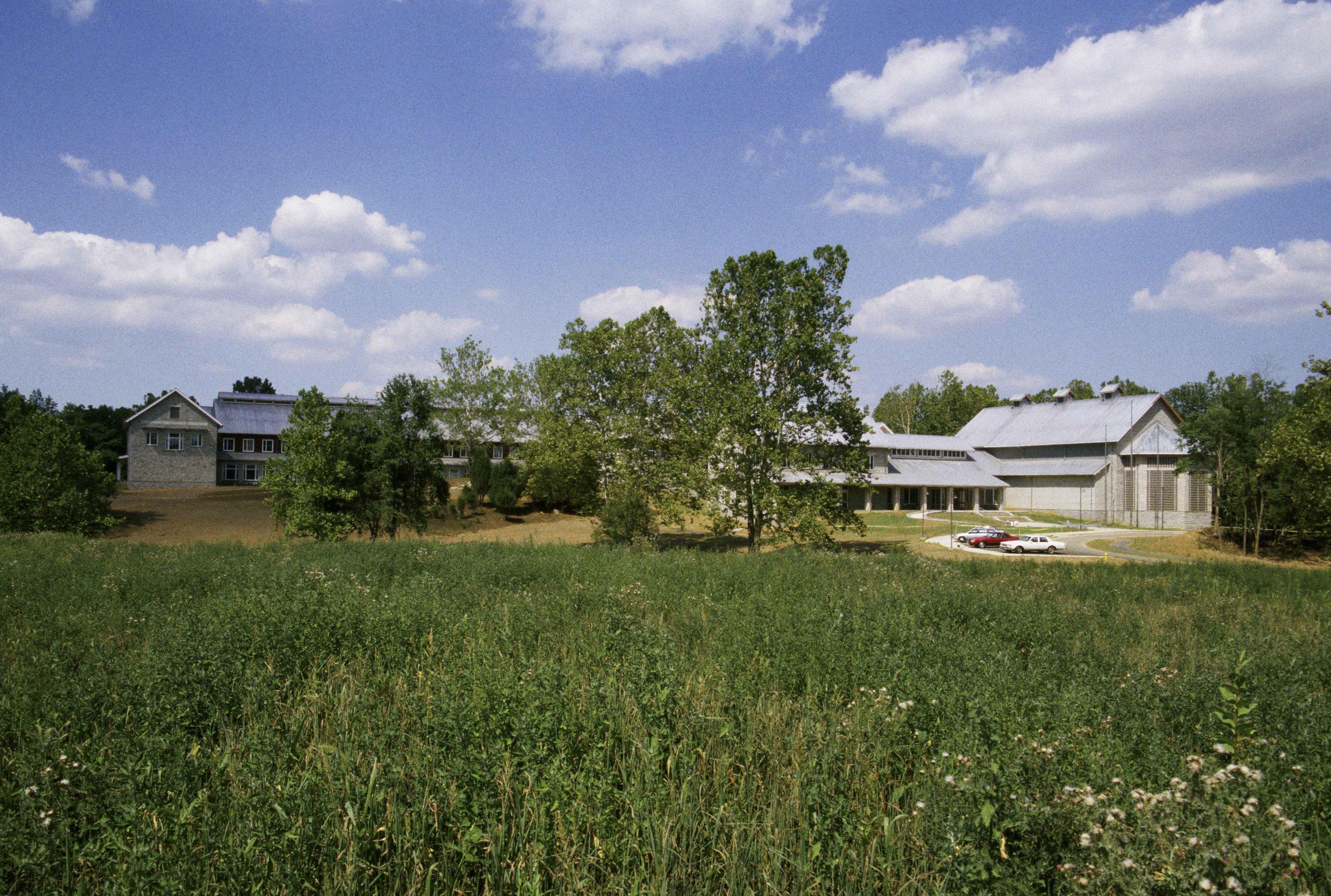 File:Building from across green grass field.jpg - Wikimedia Commons