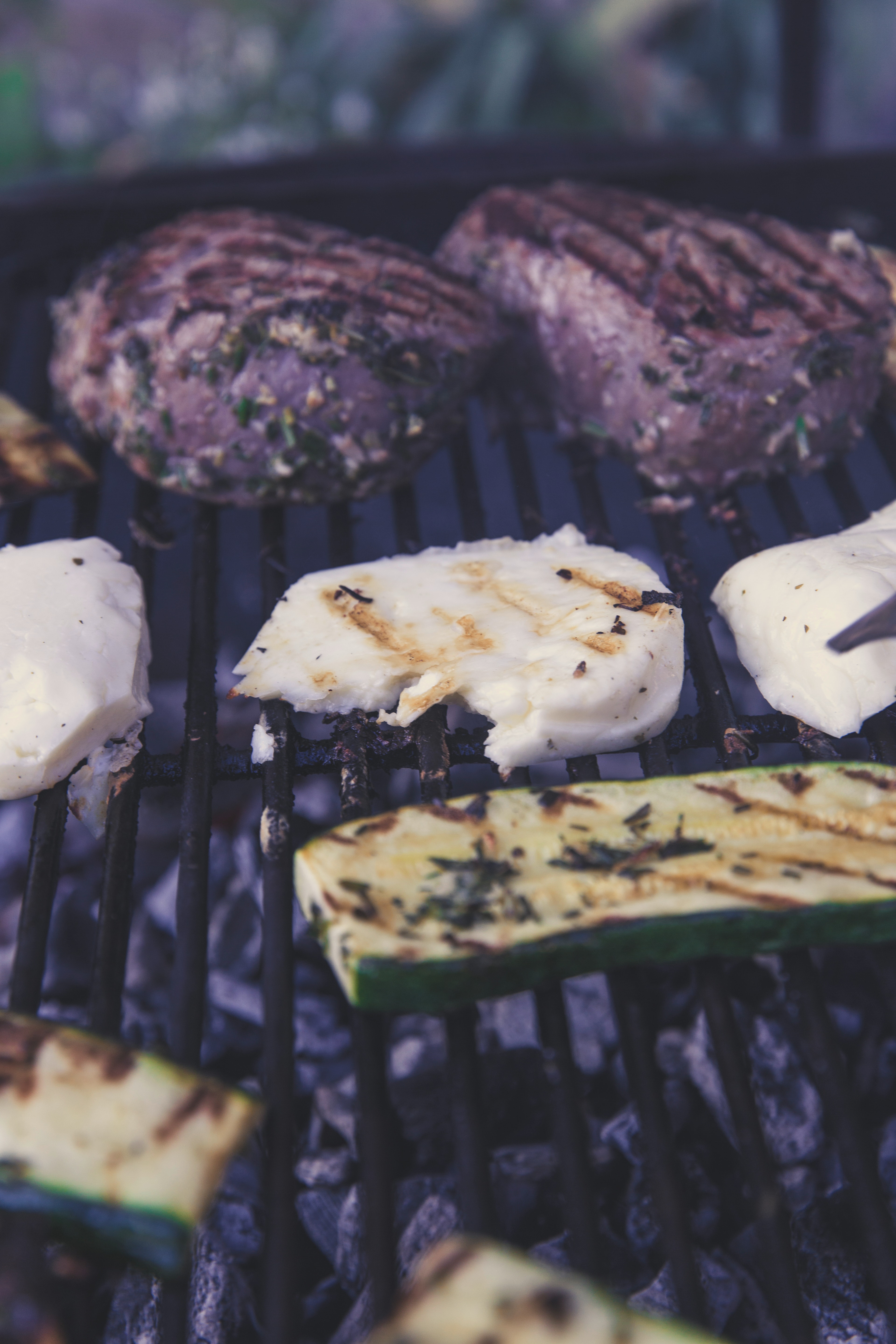 Green grilled sliced cucumber on black grill photo