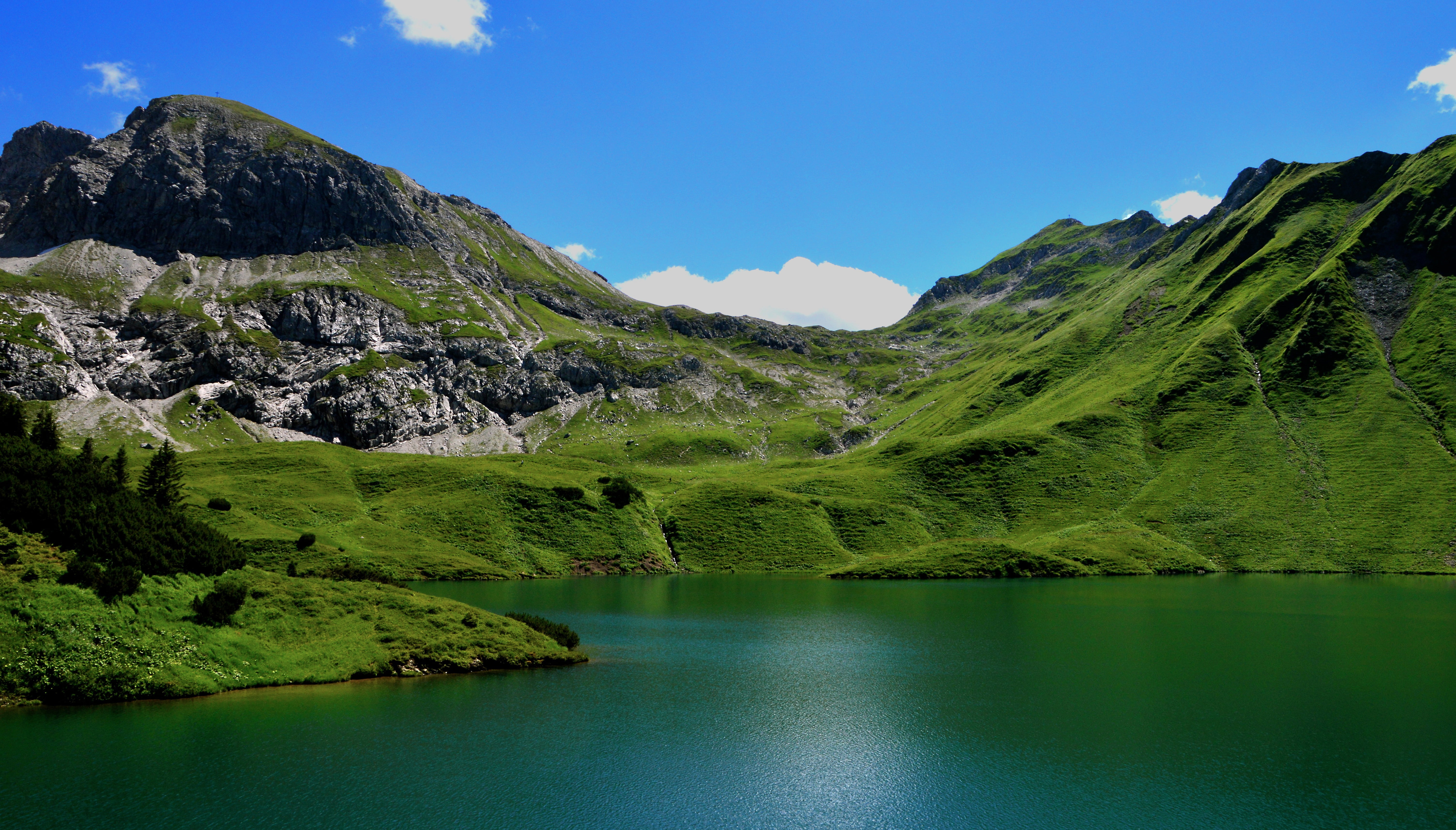 Landscape photo of green mountains near body of water HD wallpaper ...