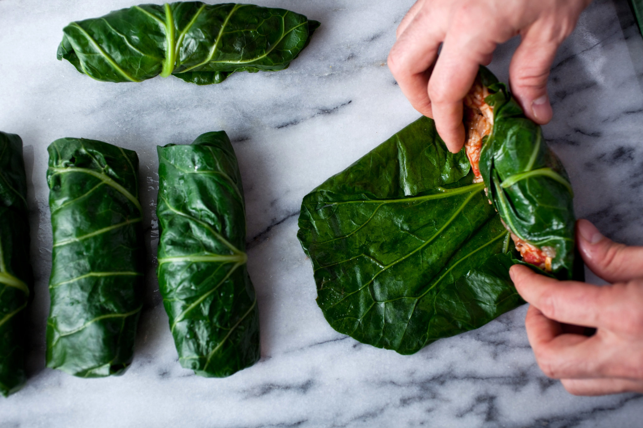 Collard Greens Stuffed With Raisins, Nuts and Rice Recipe - NYT Cooking