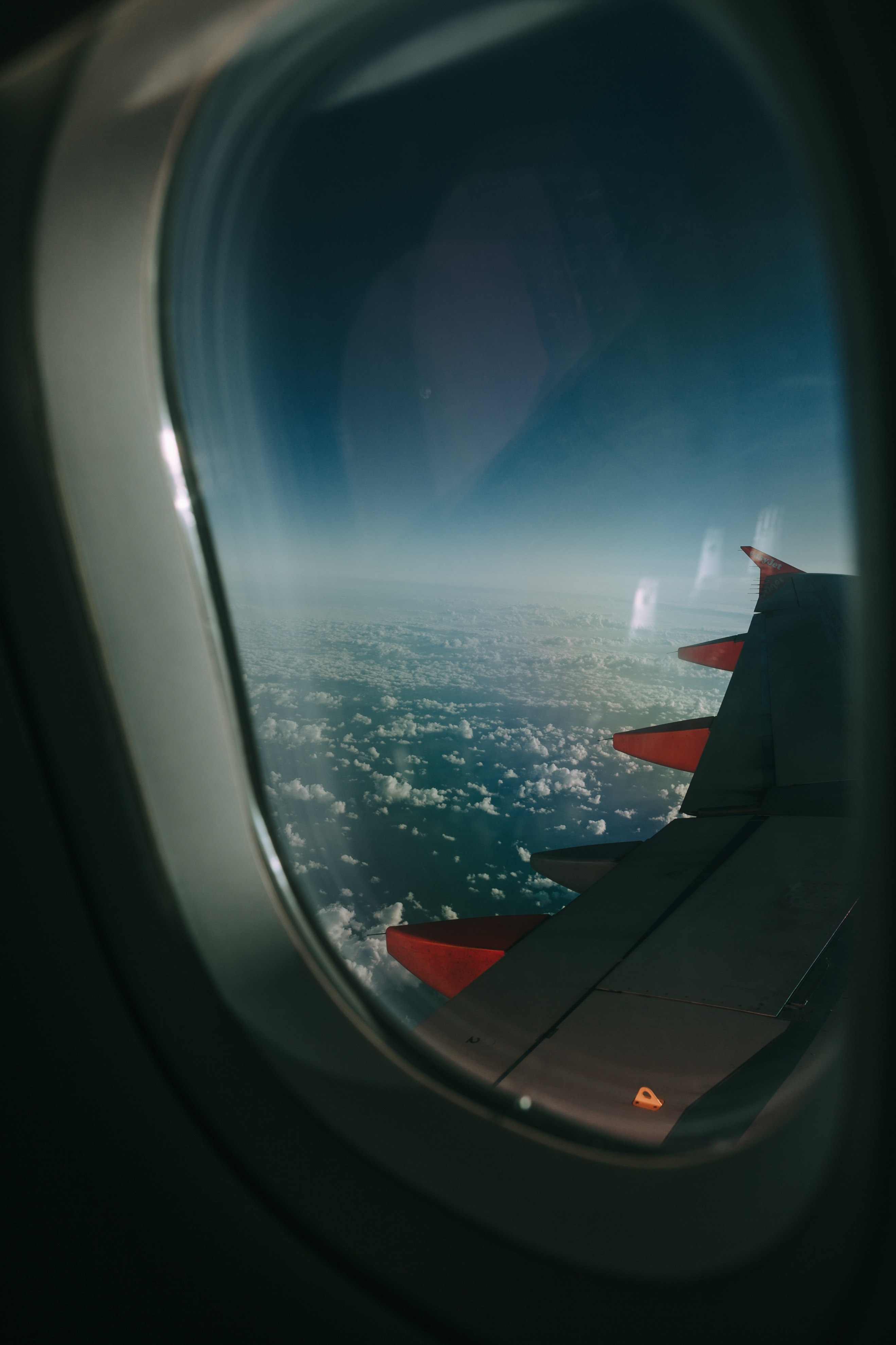 Grey airplane window photo
