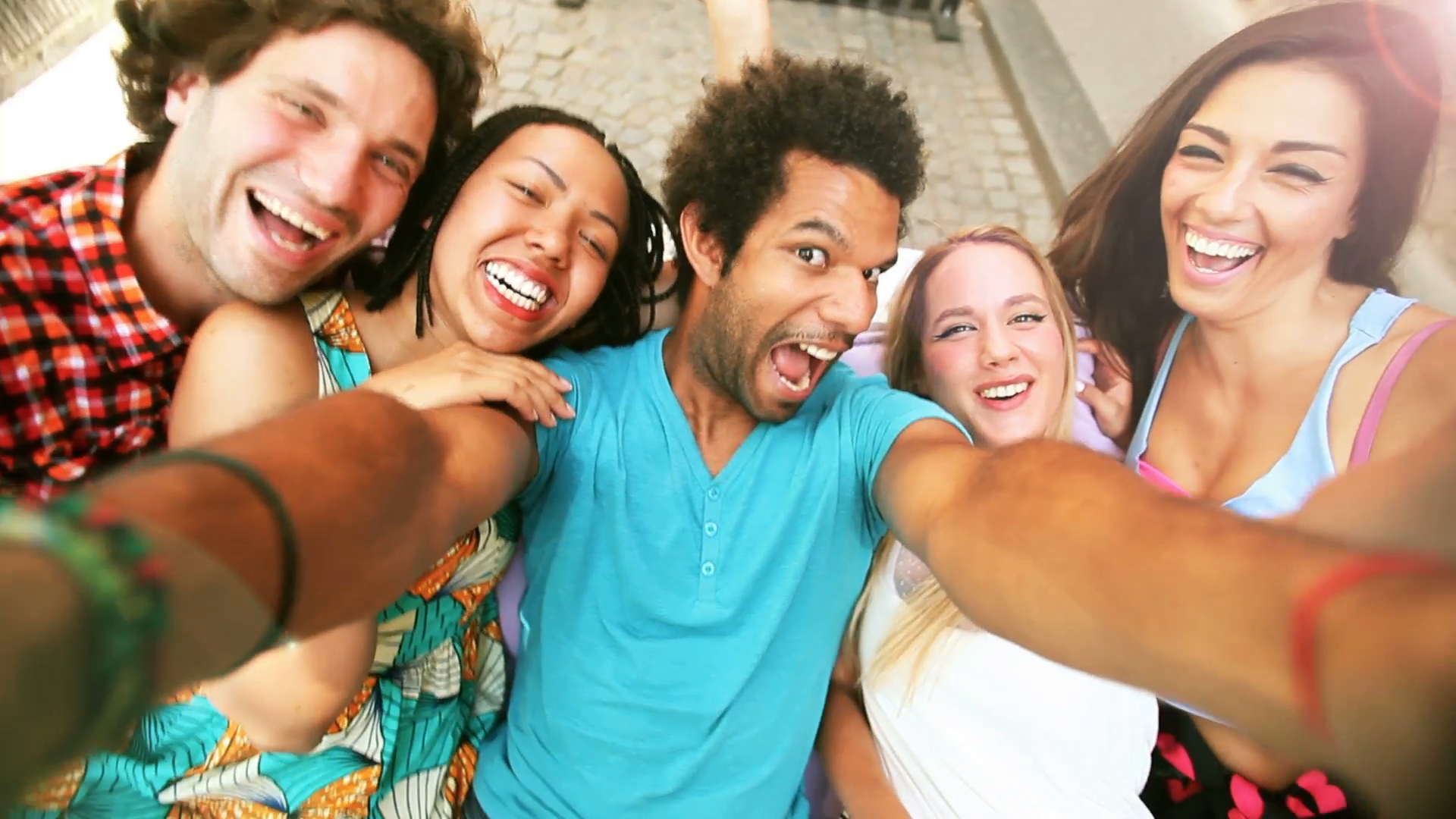 A close up of a group of five friends having fun taking a group ...
