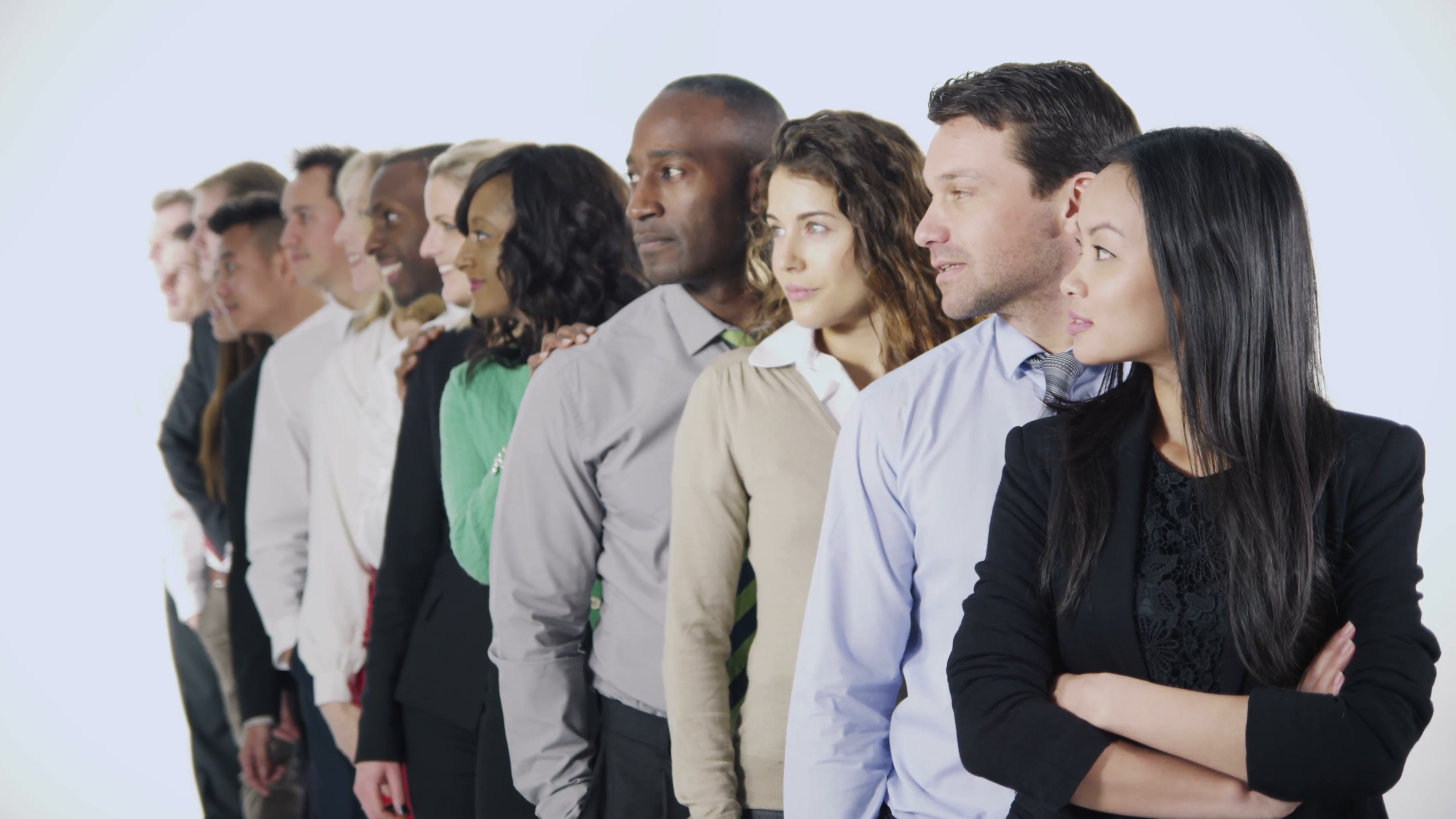 Portrait of a large multi ethnic group of business people standing ...