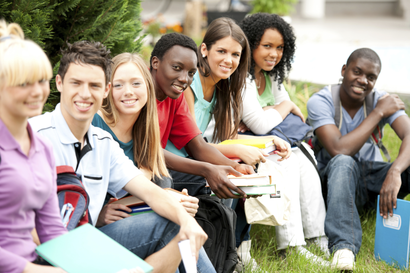 Group of teenage students enjoying outside. - NFTSD