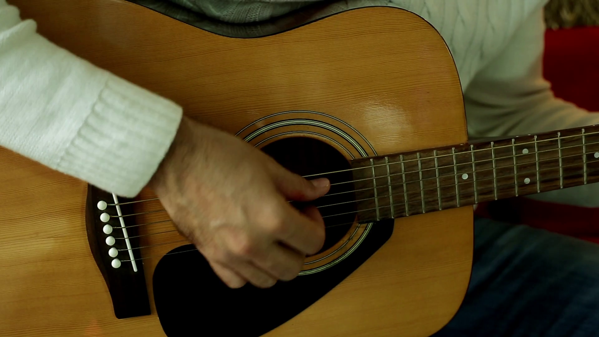 Man playing guitar close-up. Fingers playing on the strings of the ...