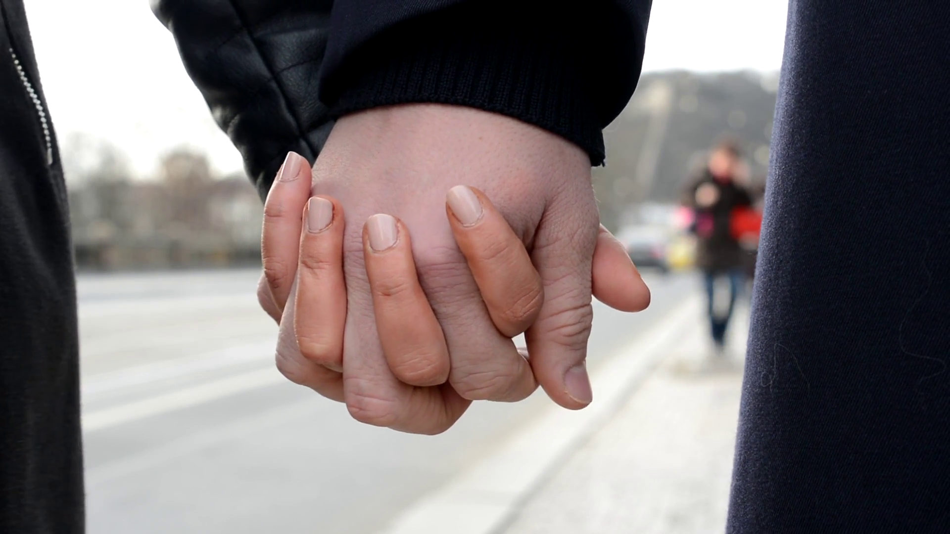 young model couple in love - couple holding hands (closeup) - urban ...