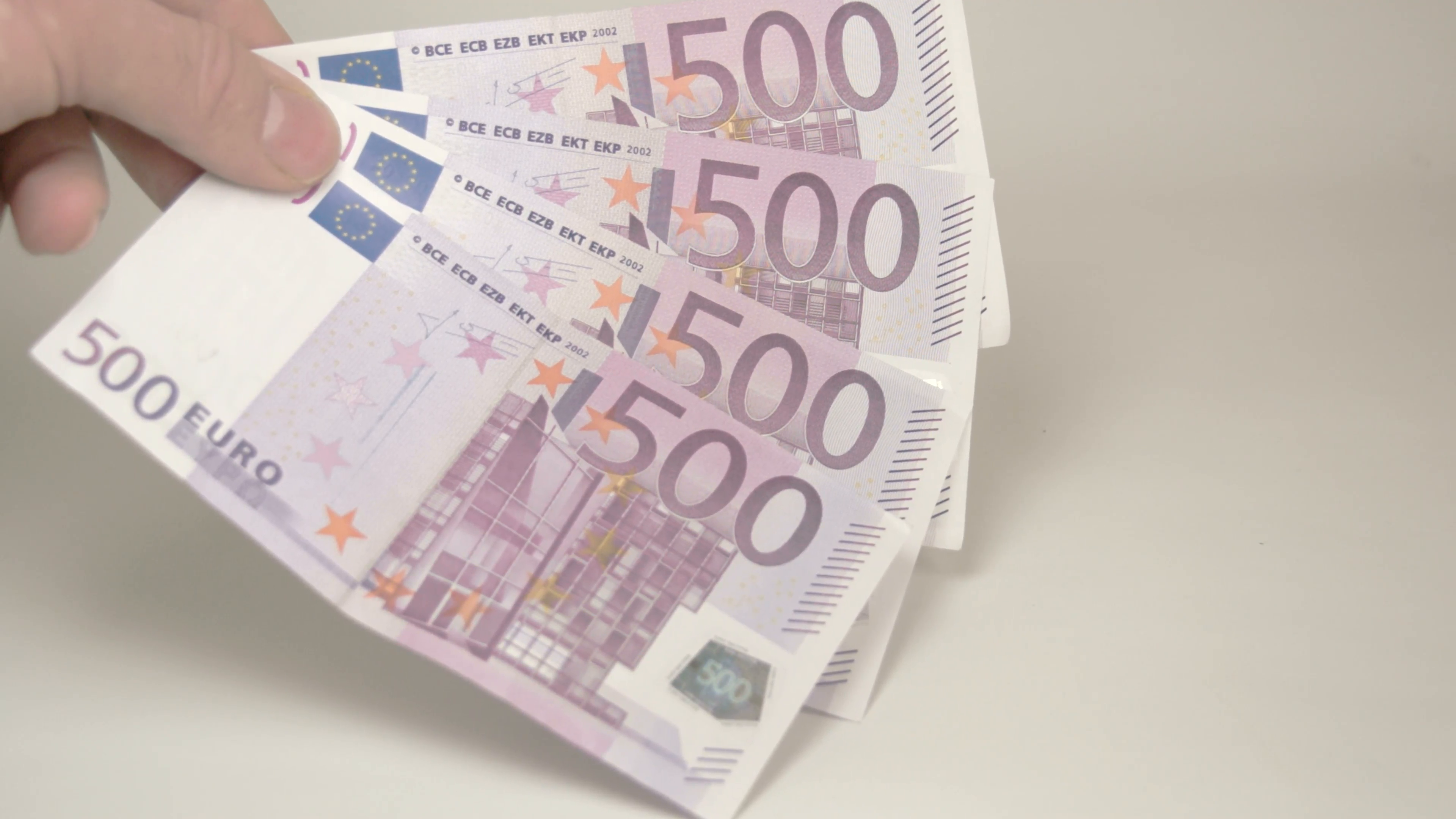 Four 500 Euro bills on the hand Stock Video Footage - VideoBlocks