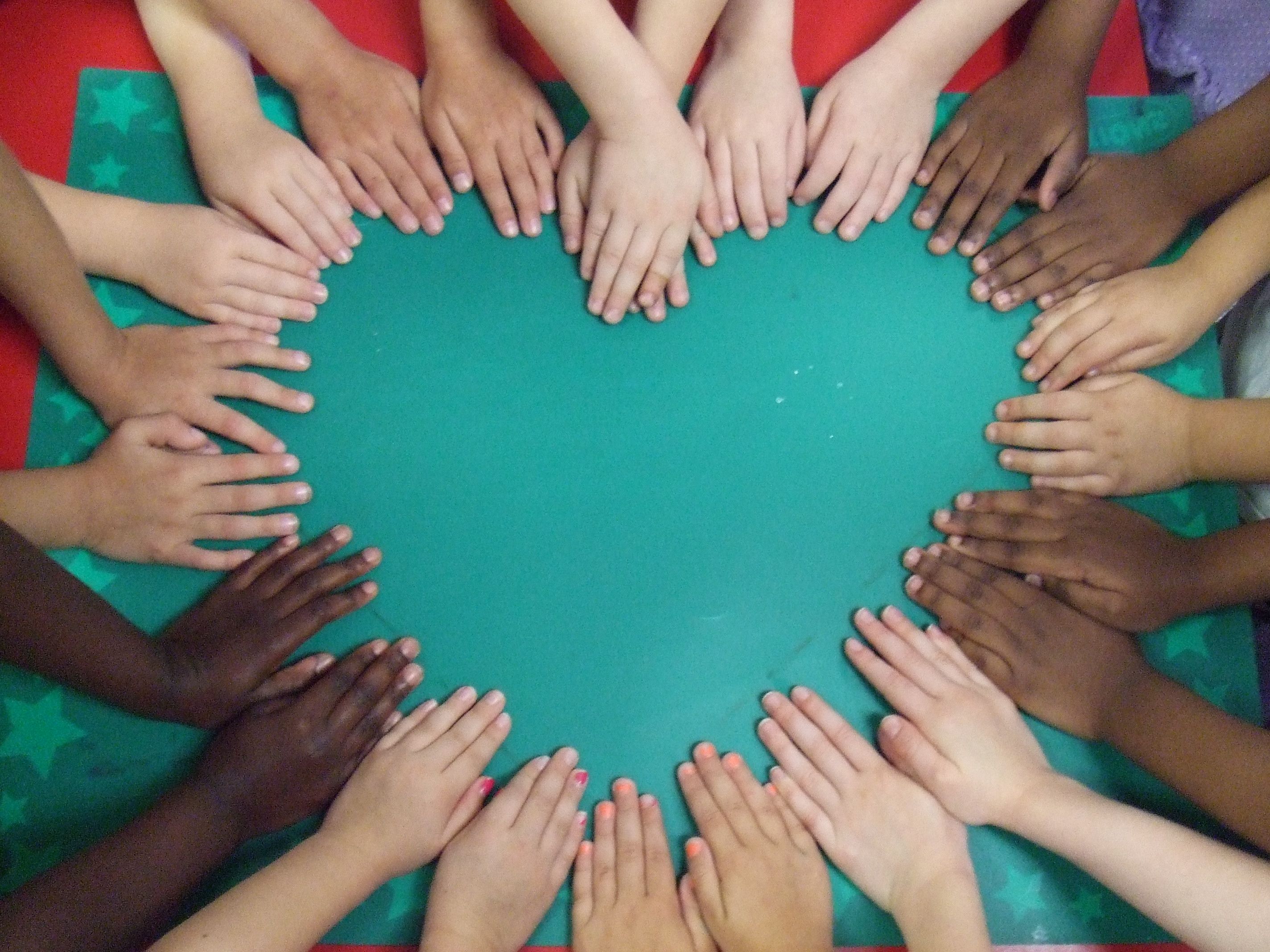 Hands in a heart shape for class photo... LOVE this idea ...