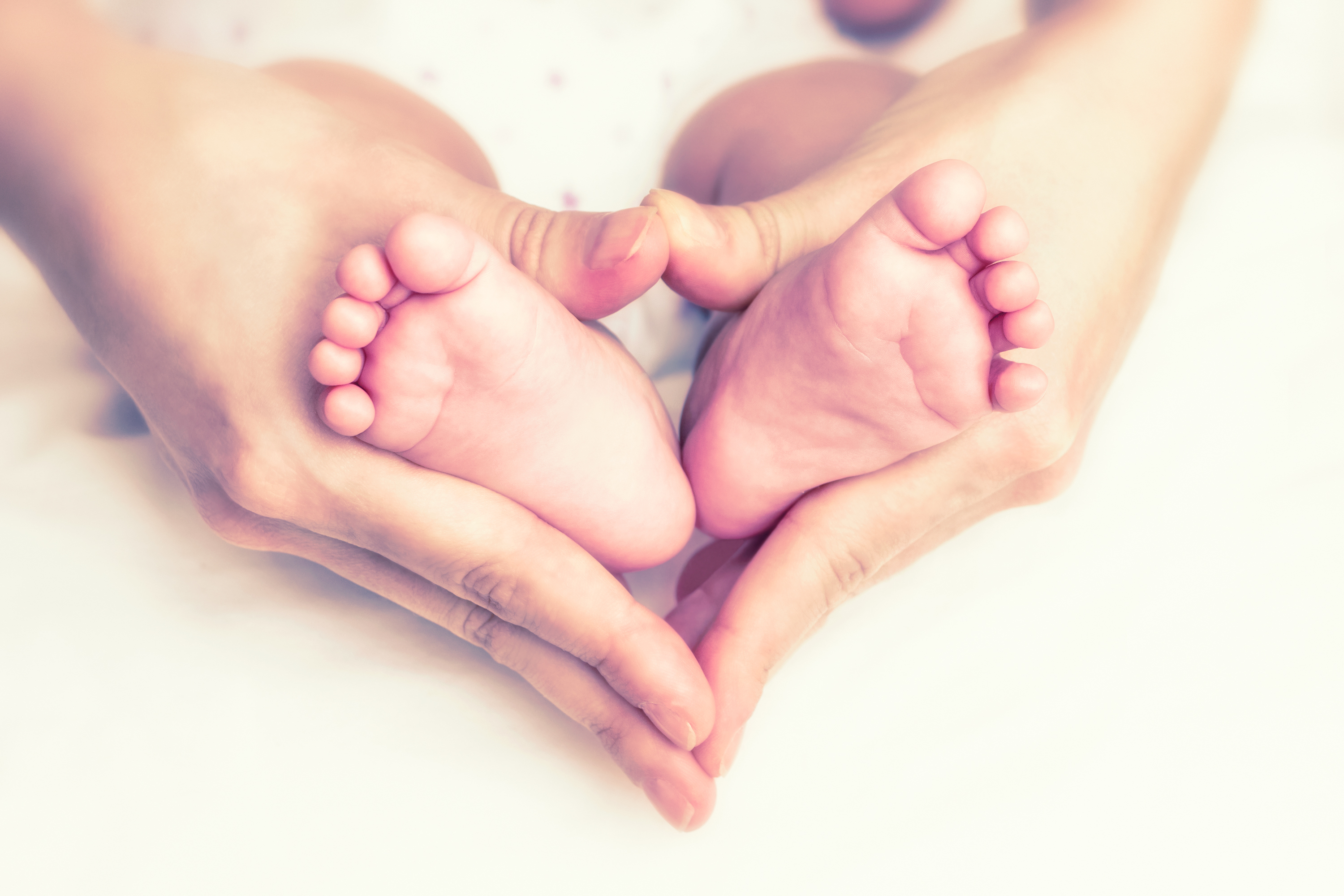Baby feet in the mother hands - Essendon Natural Health