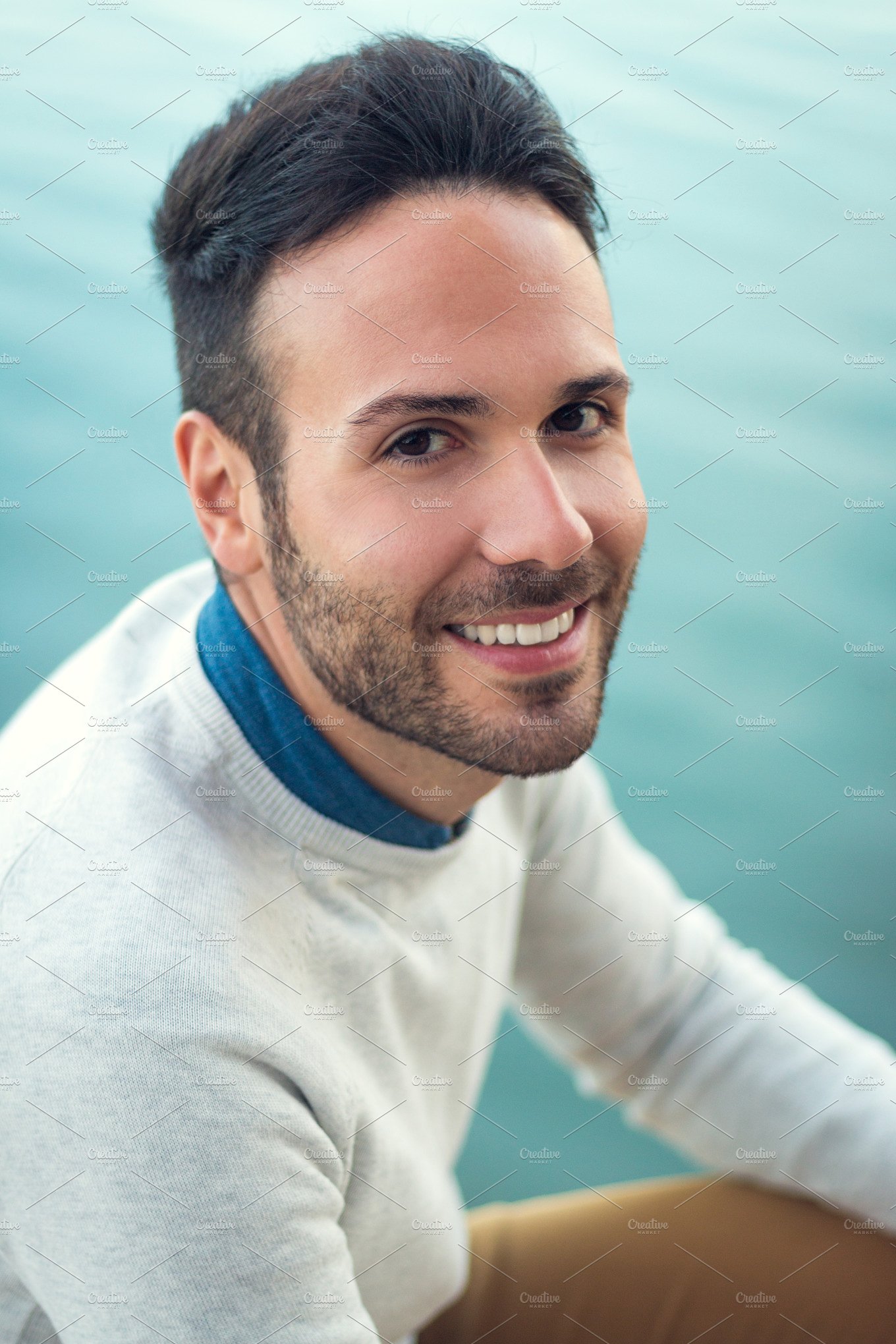 Portrait of a handsome guy smiling ~ People Photos ~ Creative Market