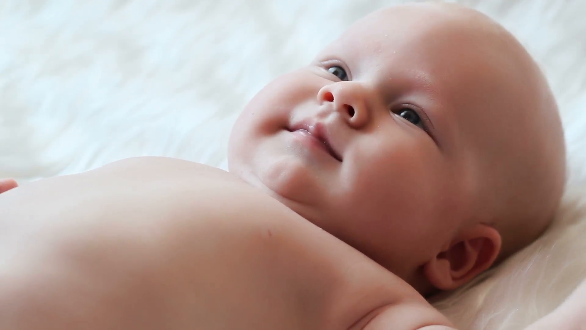 Happy newborn baby smiling closeup Stock Video Footage - VideoBlocks