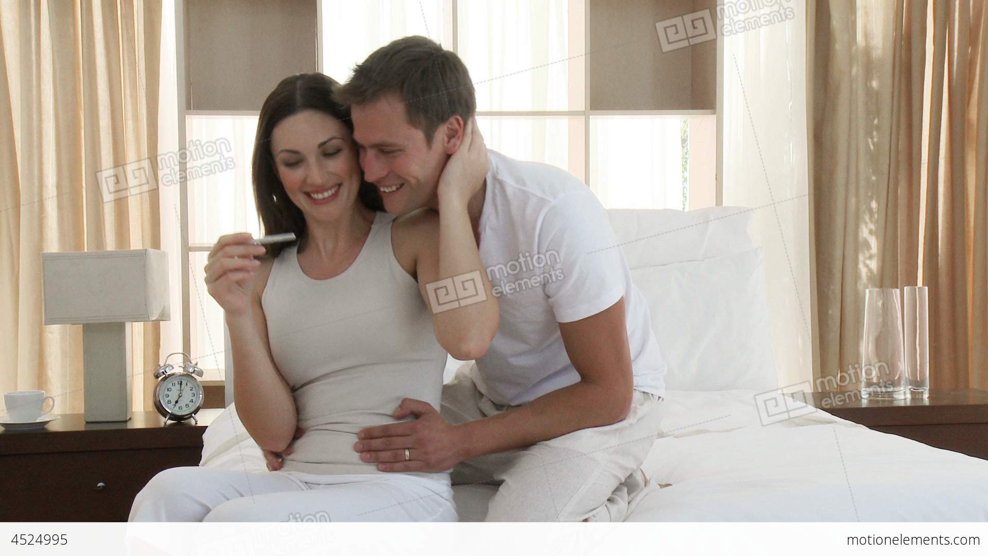 Happy Couple Looking At A Positive Pregnancy Test Stock video ...
