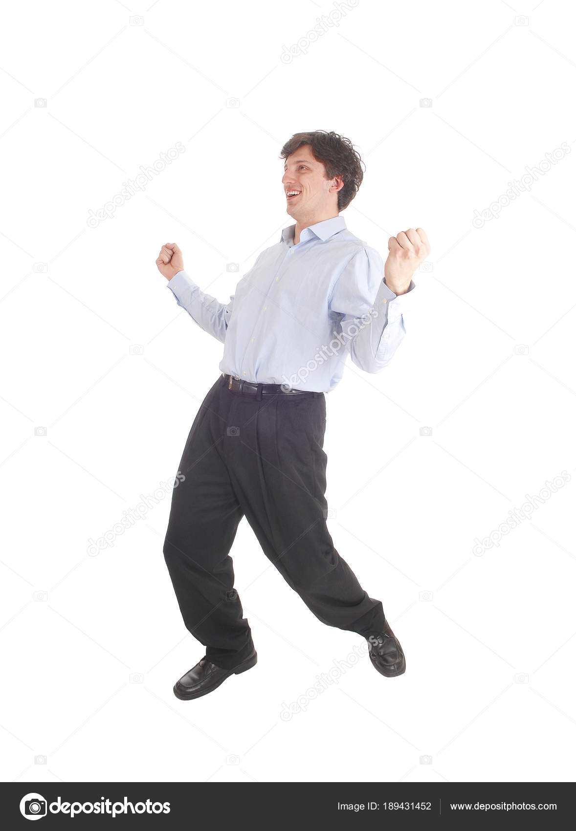 Happy young man dancing in shirt and dress pants — Stock Photo ...