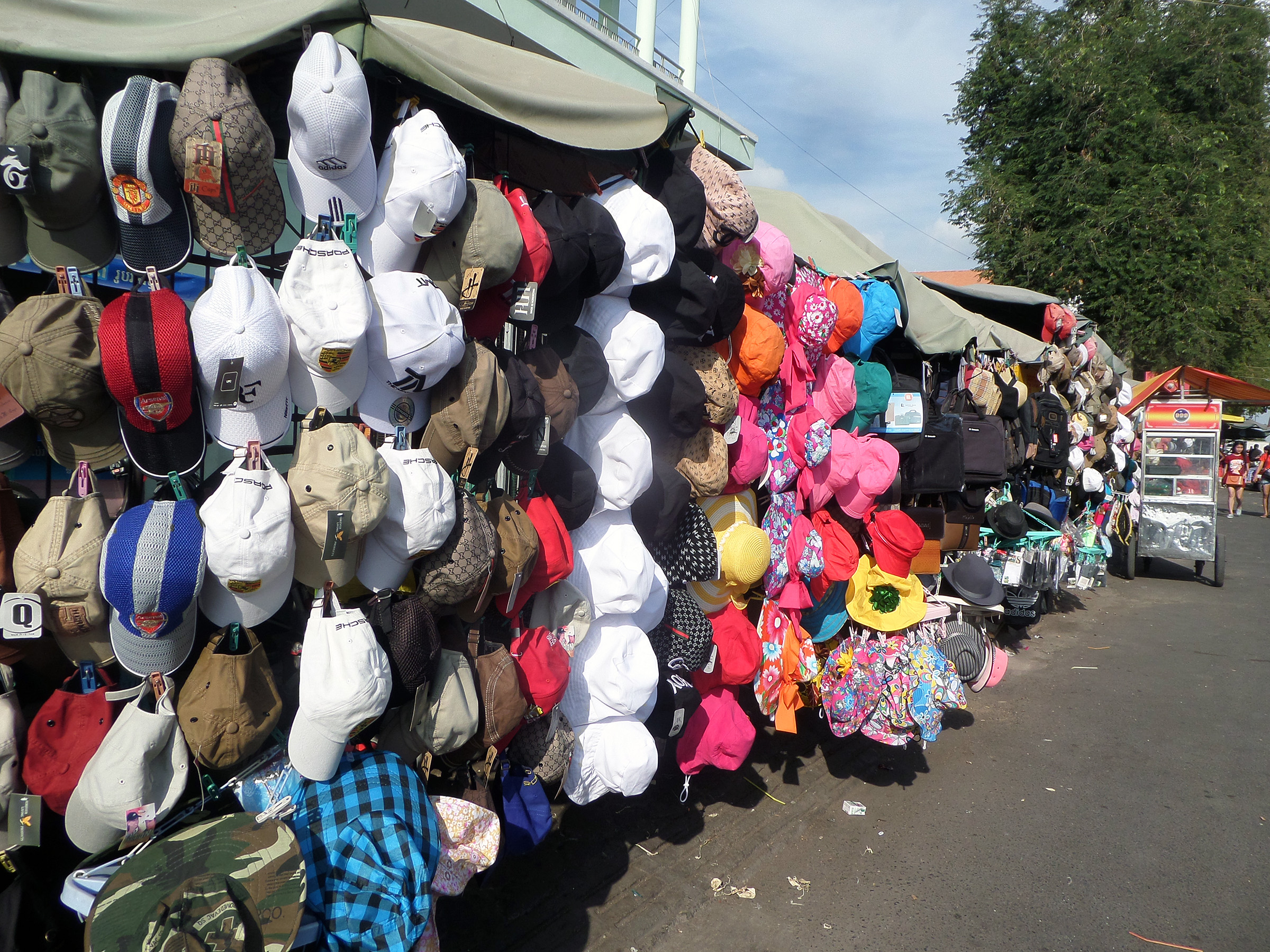 Hat stalls at market photo