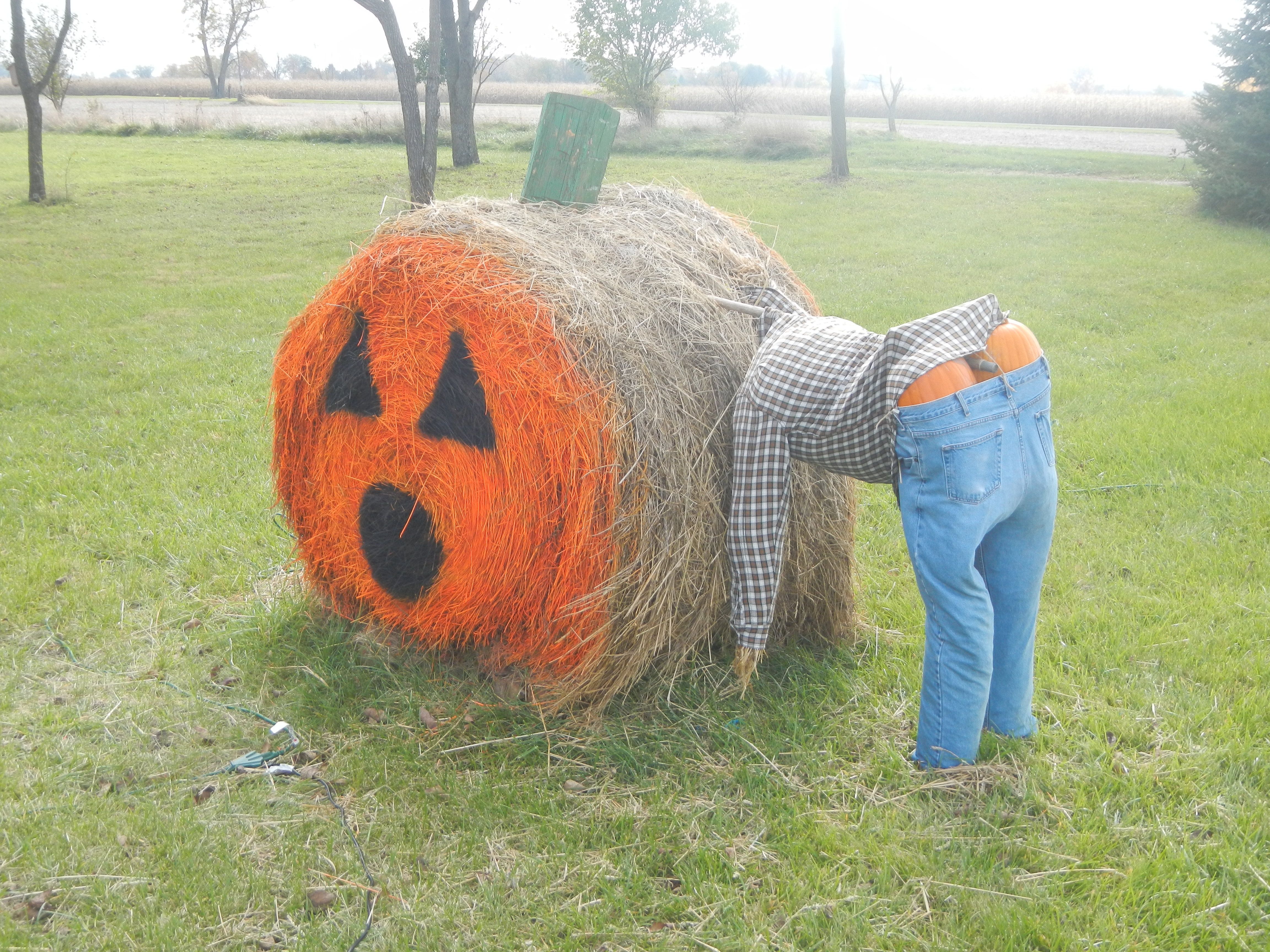 Halloween hay bale pumpkin with farmer mooning! | Double H projects ...