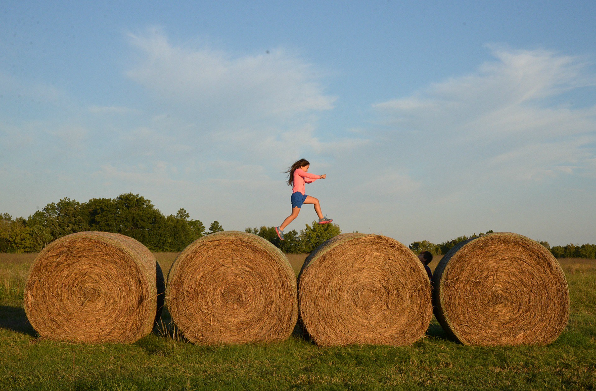 Jumping Hay Bales in East Texas • Jennifer McCollum