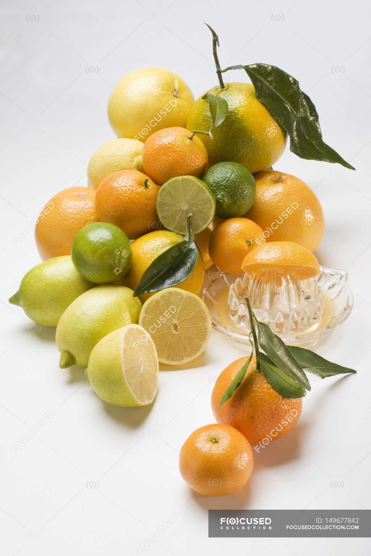 Assorted citrus fruits in heap — Stock Photo | #149677842