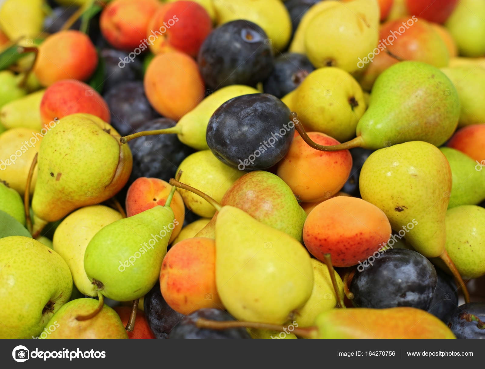 Colorful various fruits in heap — Stock Photo © joruba75 #164270756