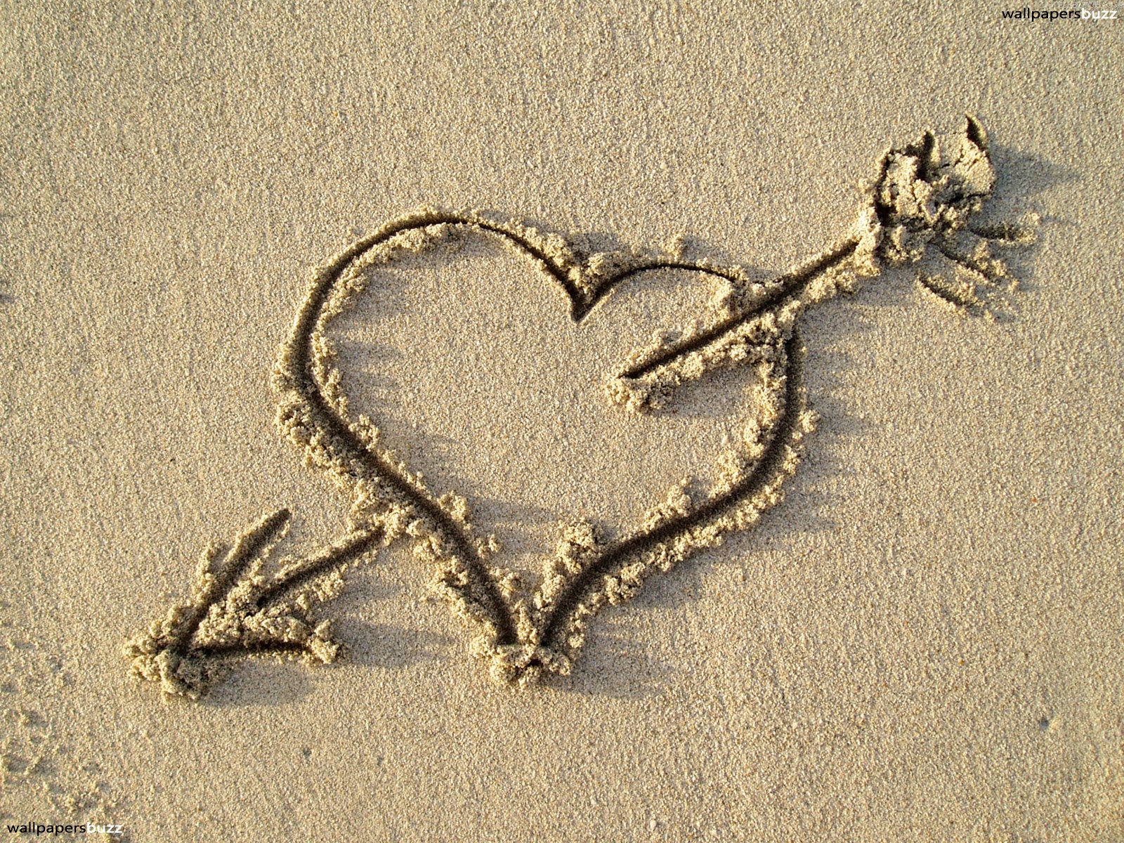 Heart on sand HD Wallpaper