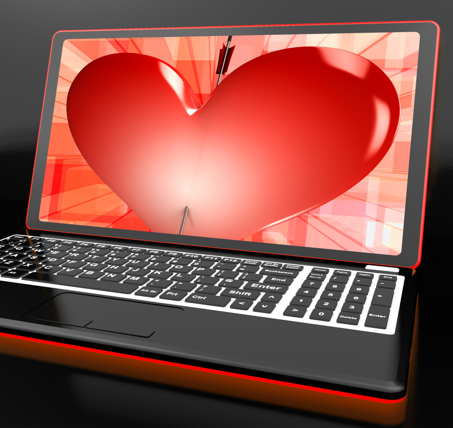 Heart on laptop showing cupid shot photo