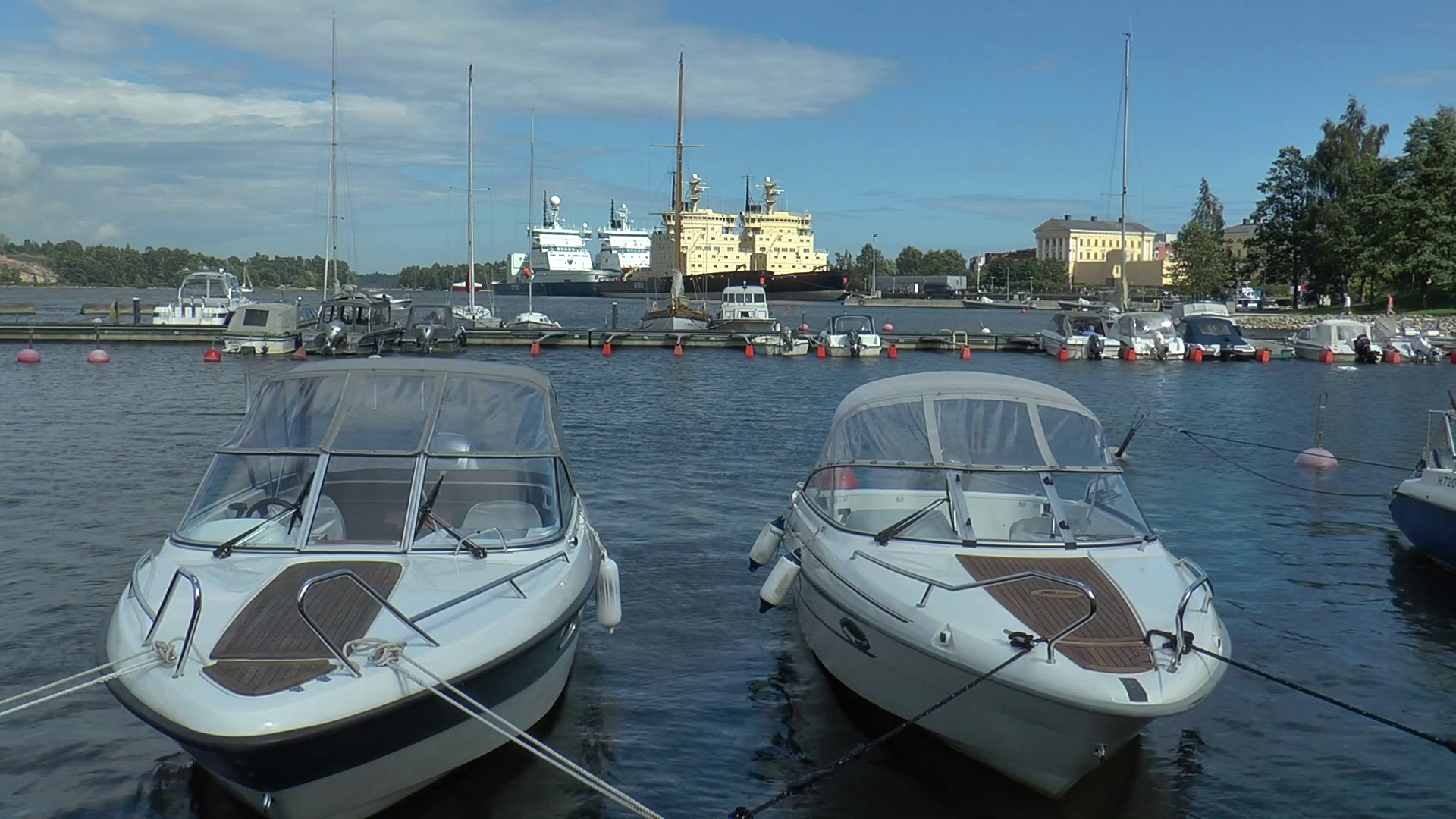 HELSINKI, FINLAND - July 12, 2016: Small motorboat on the background ...