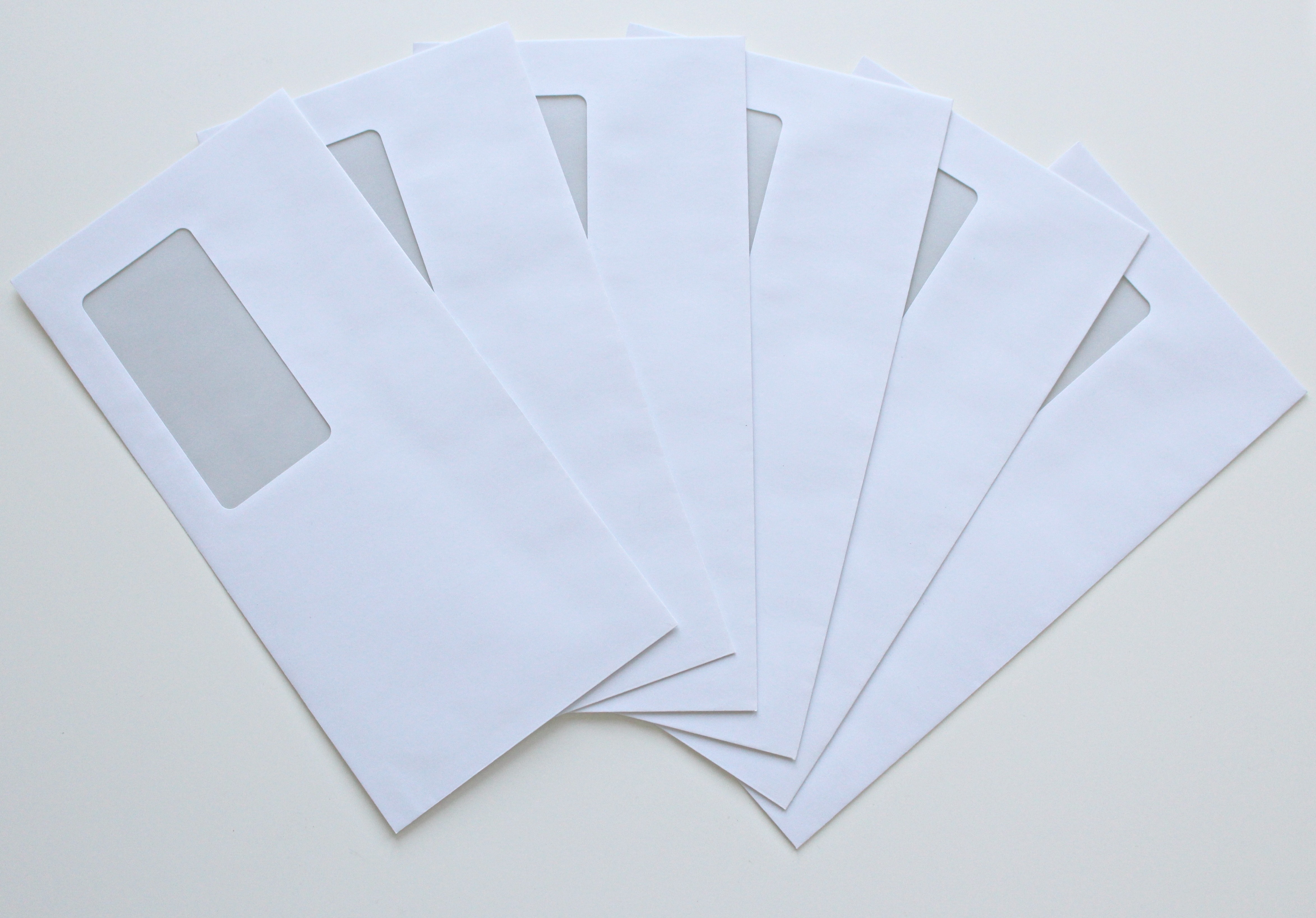 High angle view of paper against white background photo