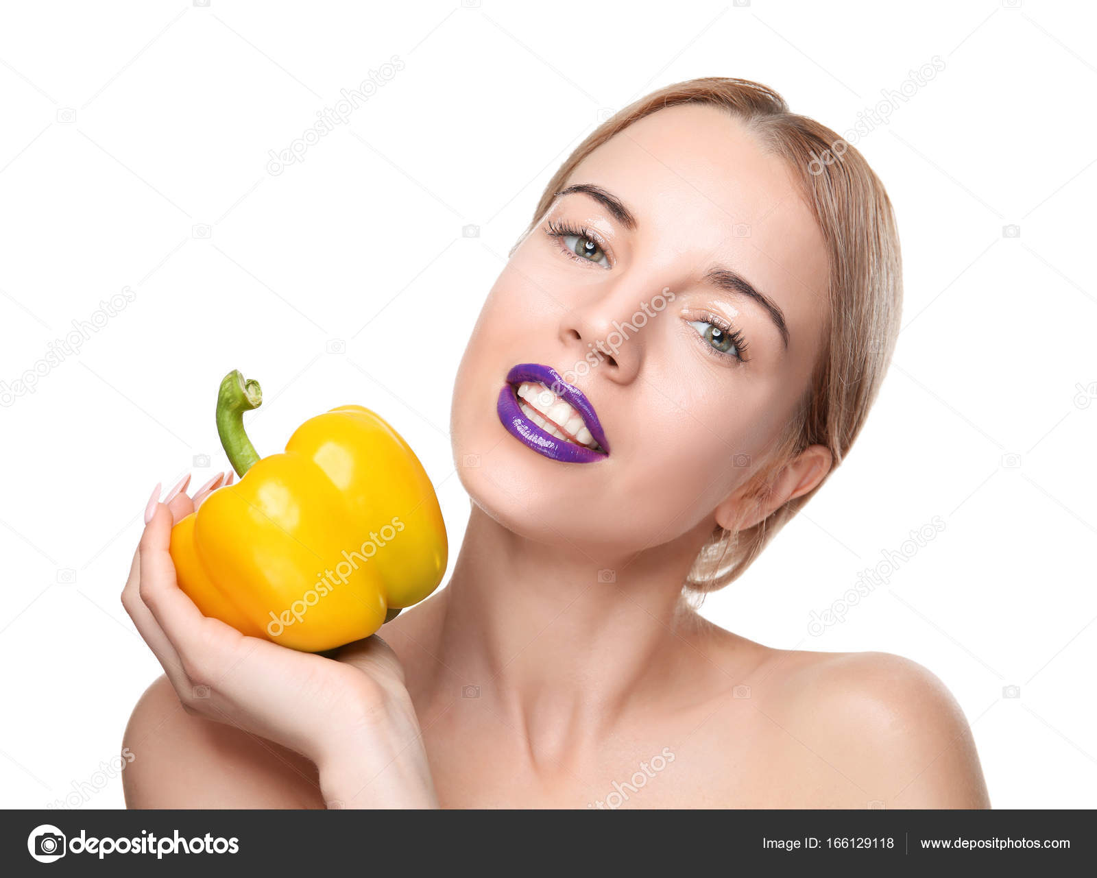 Young woman holding bell pepper — Stock Photo © belchonock #166129118