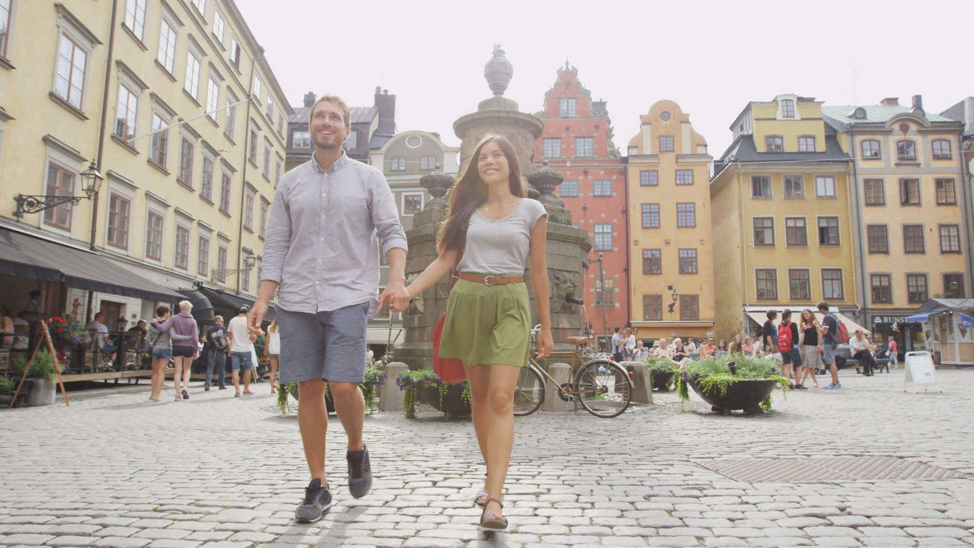 Couple walking holding hands in city of Stockholm, Sweden, Europe ...