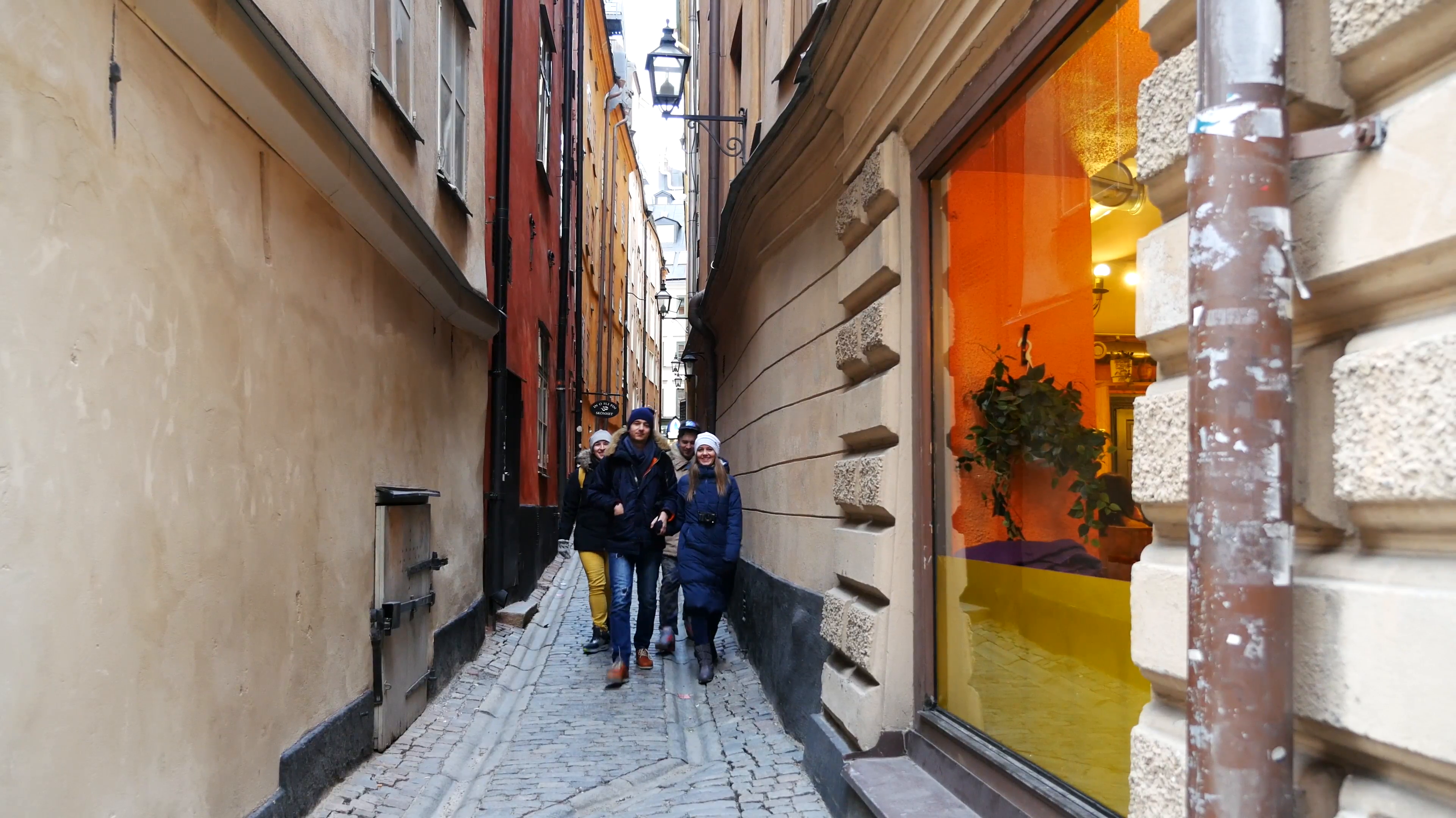 two Couple walking holding hands in city of Stockholm, Sweden ...