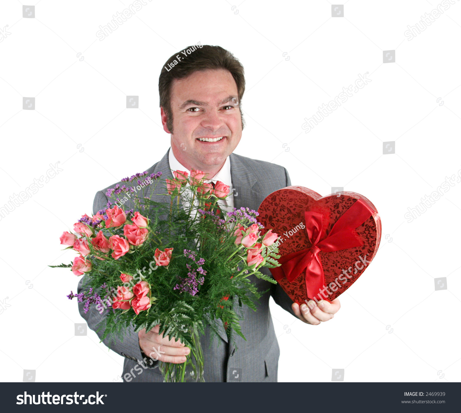 Smiling Man Holding Roses Valentines Candy Stock Photo & Image ...