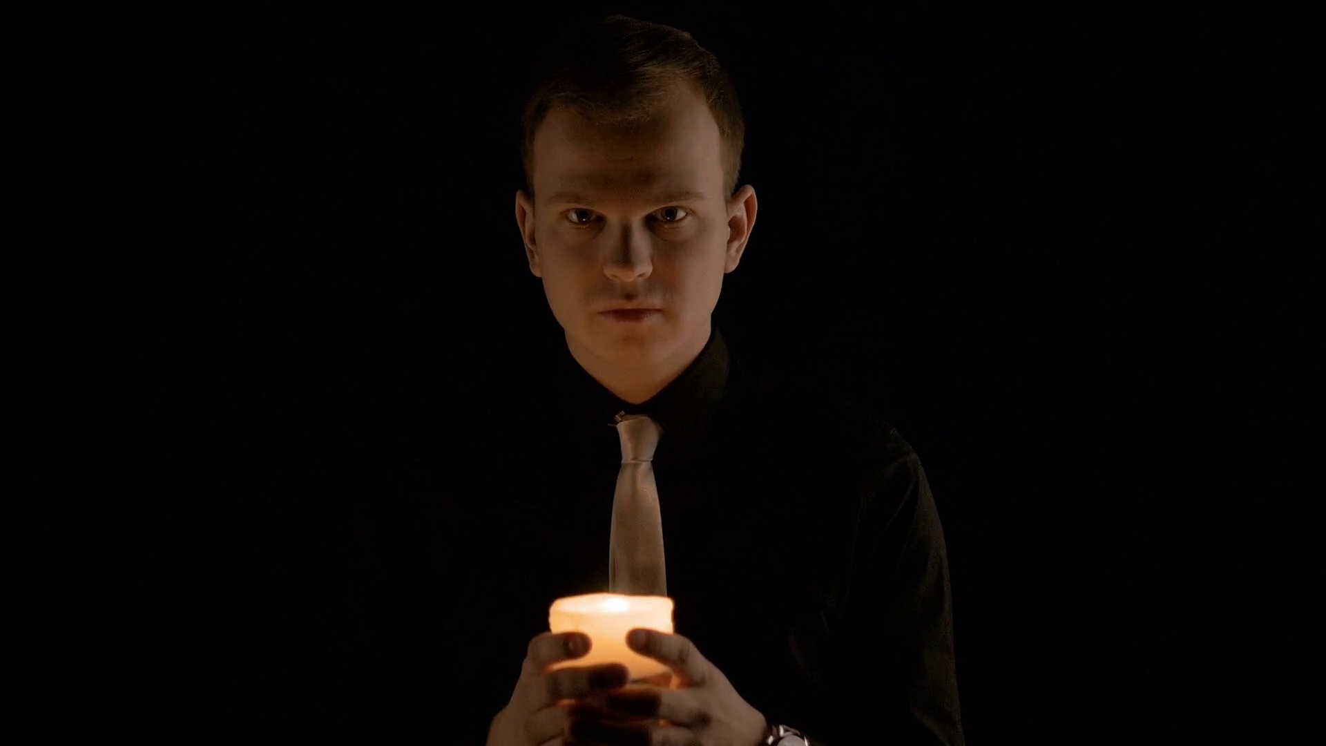 Love handsome young man holding a candle. Romantic date. Stock Video ...