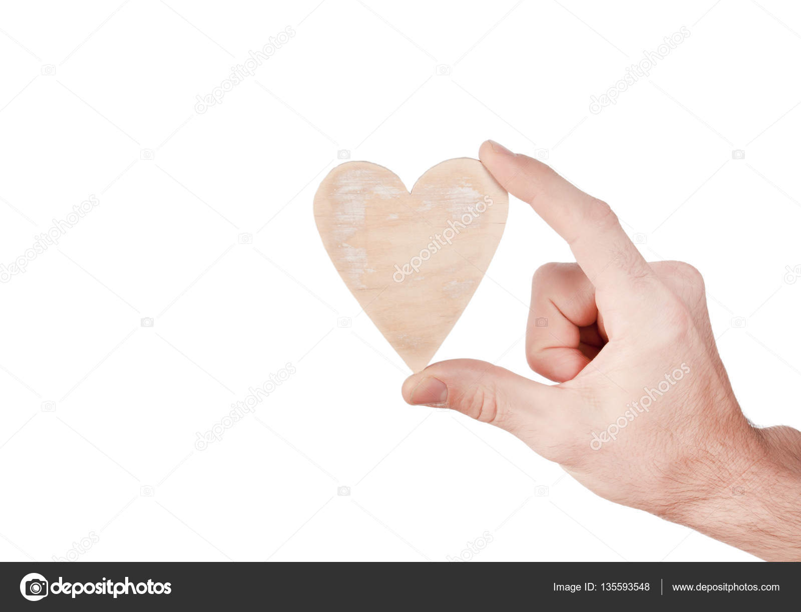 Hand holding wood heart — Stock Photo © Arybickii #135593548