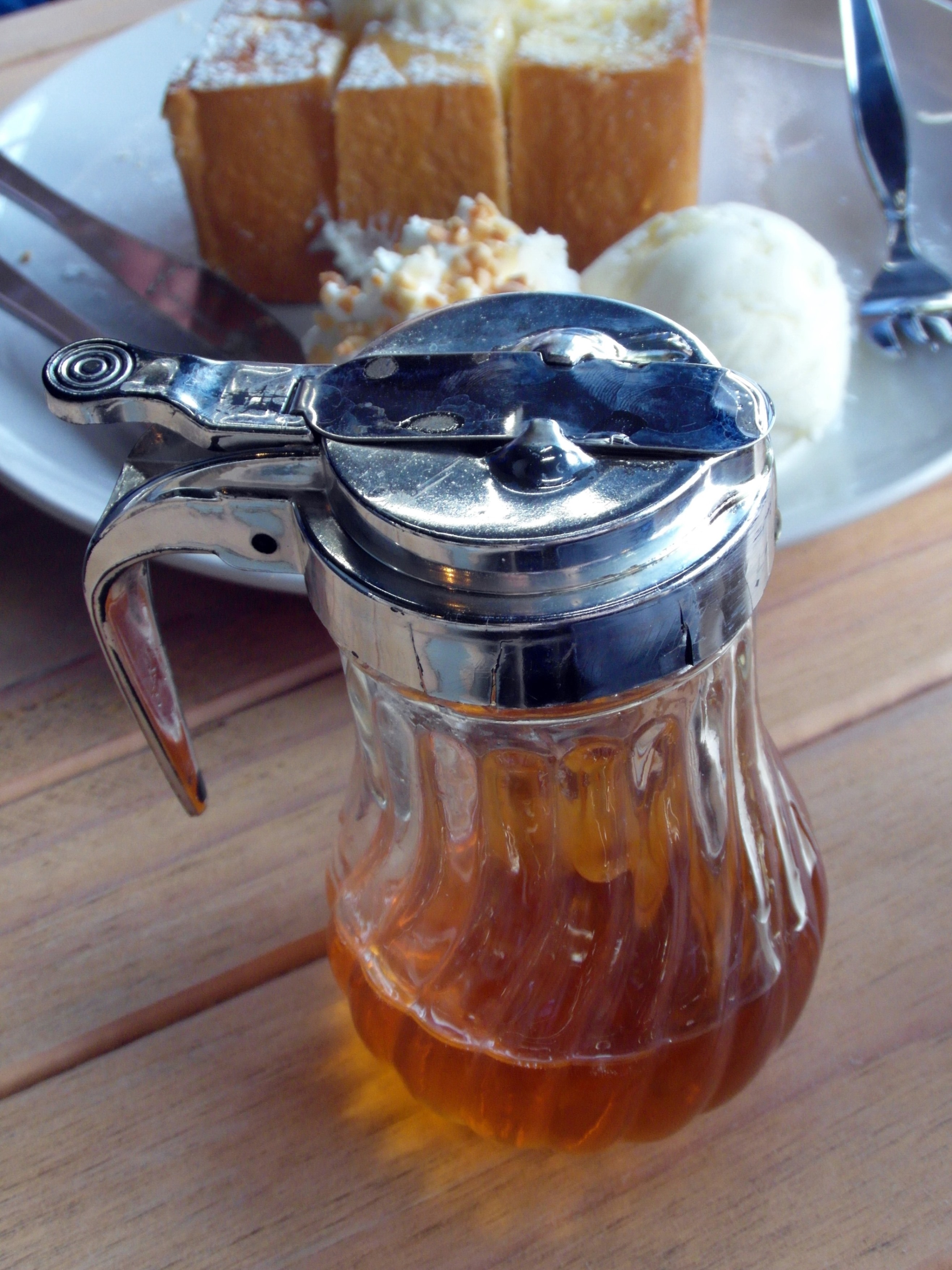 Honey pot with dessert photo
