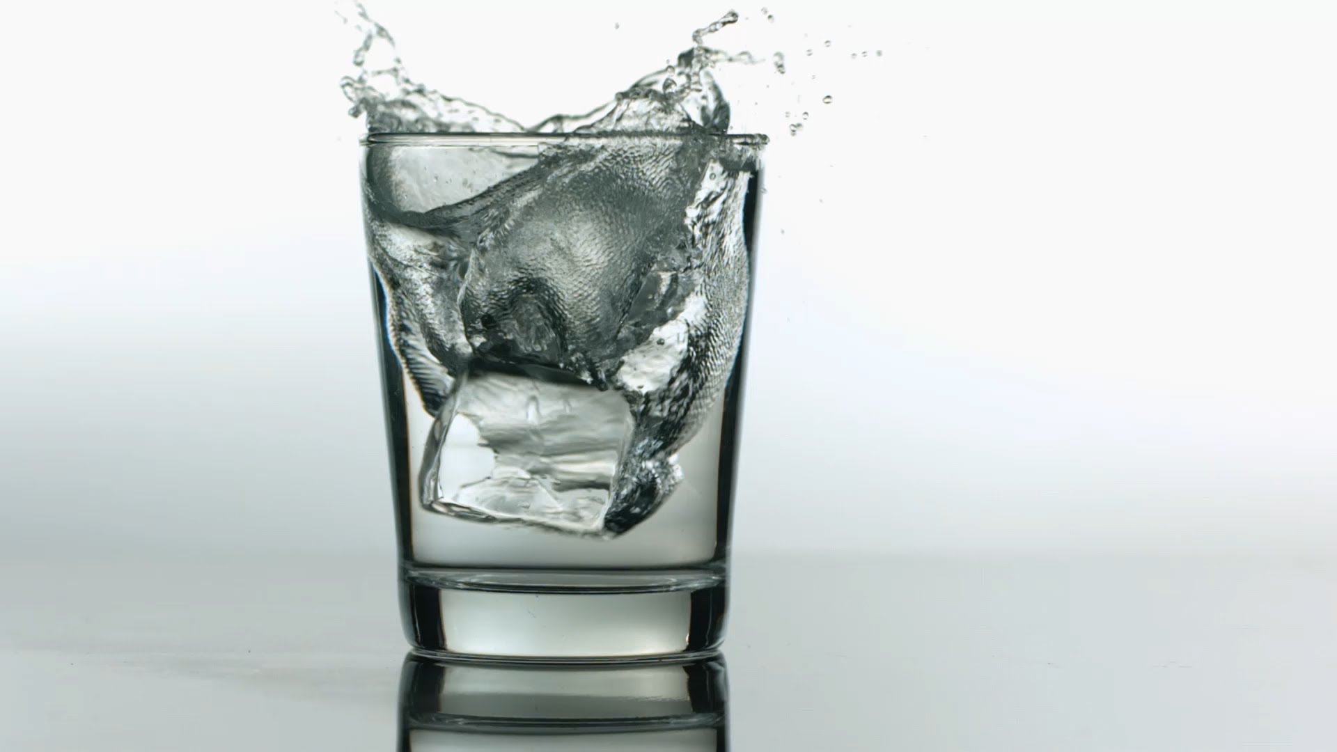 Free Slow Motion Footage: Ice Cubes Into Glass of Water - YouTube