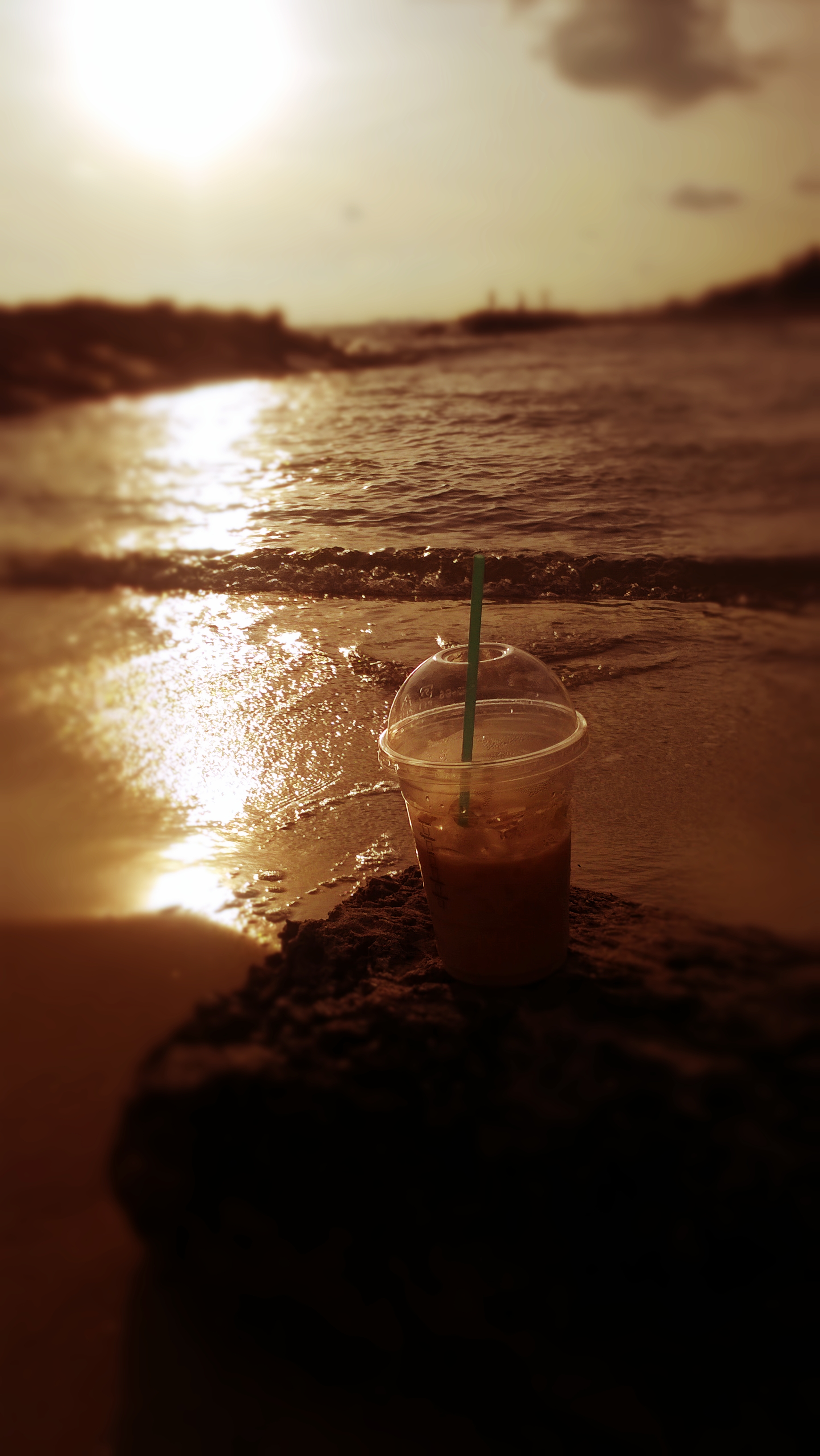 Ice coffee on the beach photo