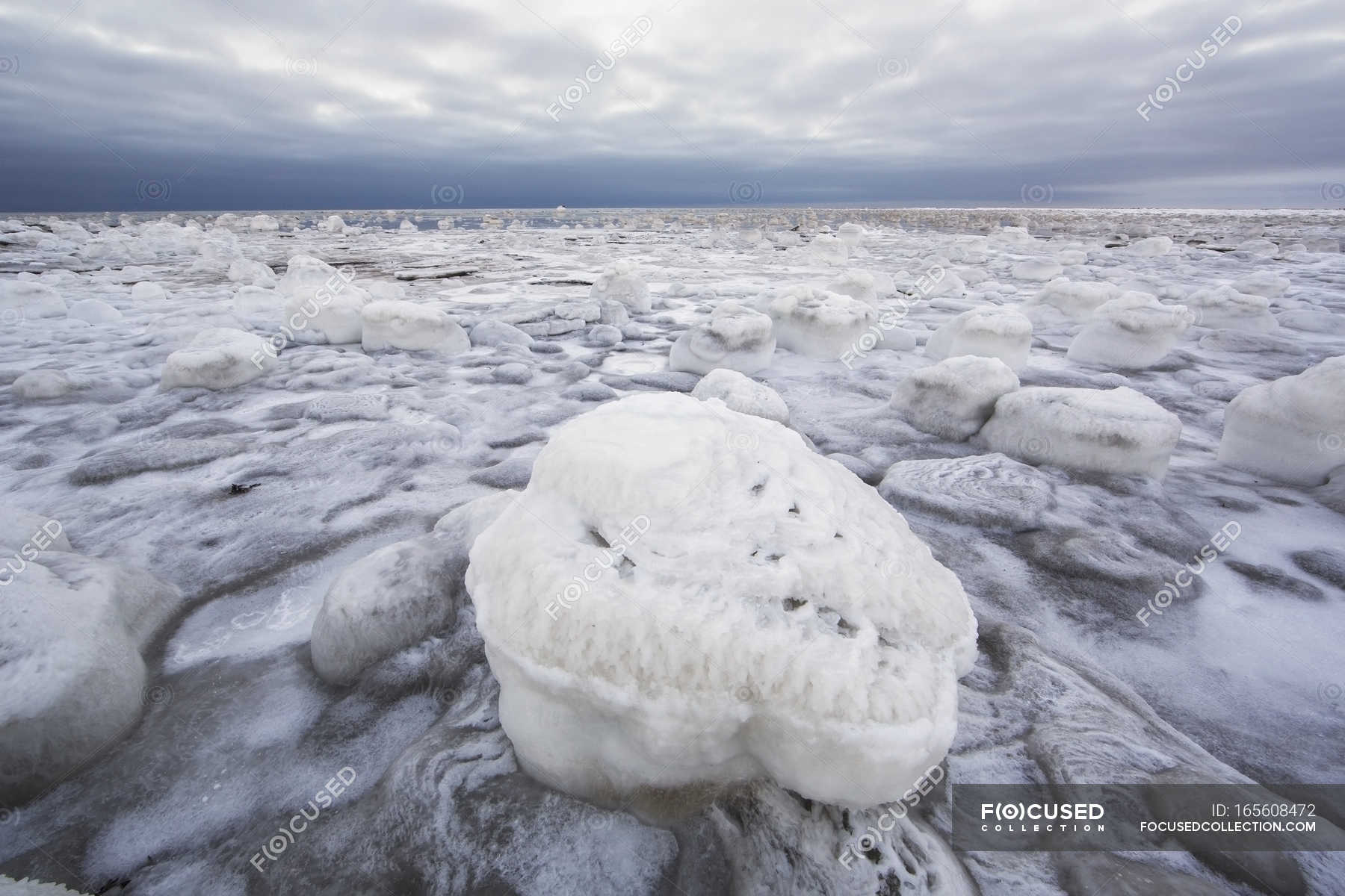 Ice covered rock along the shores of hudson bay — Stock Photo ...