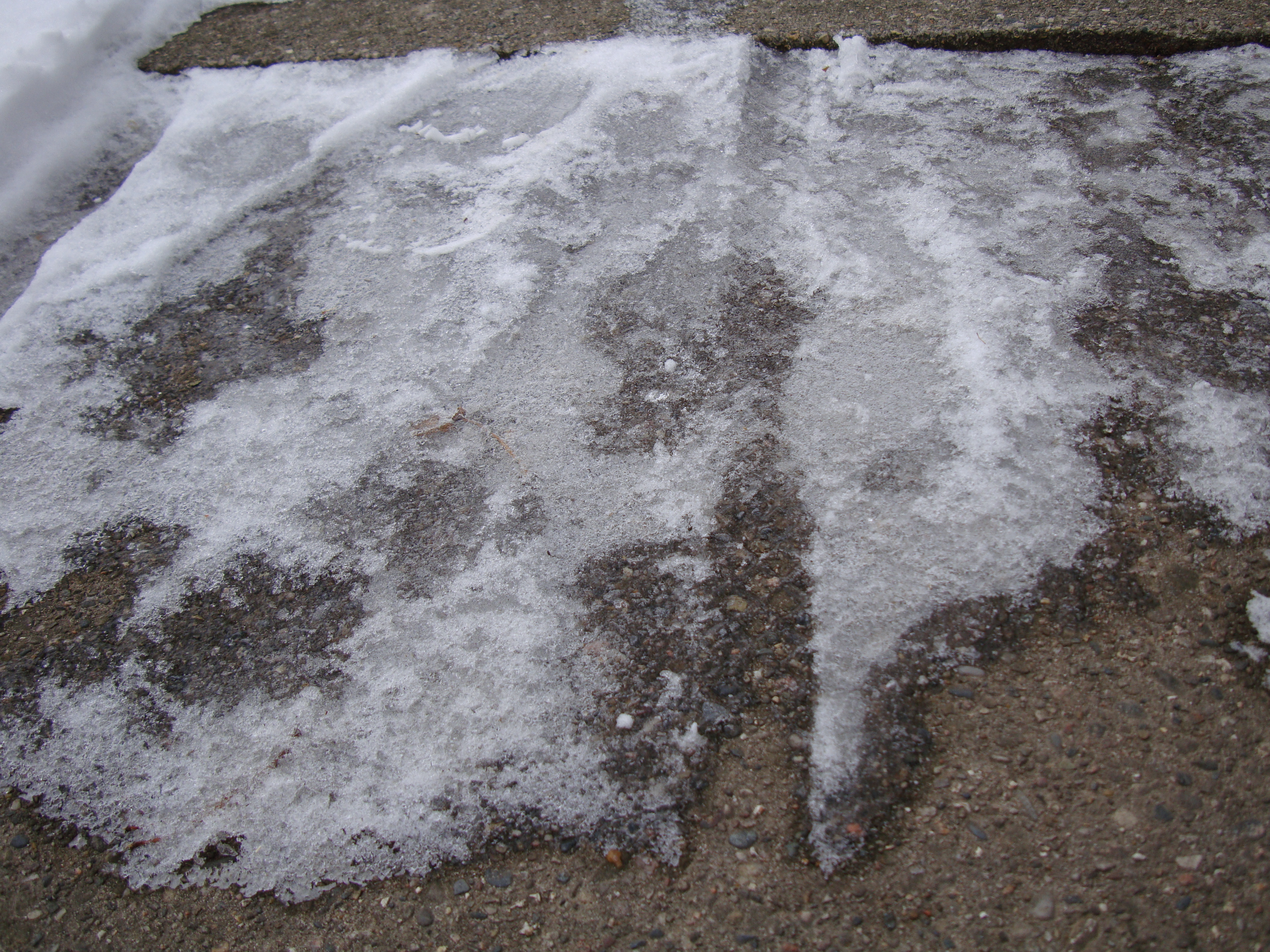 Ice-covered sidewalk photo