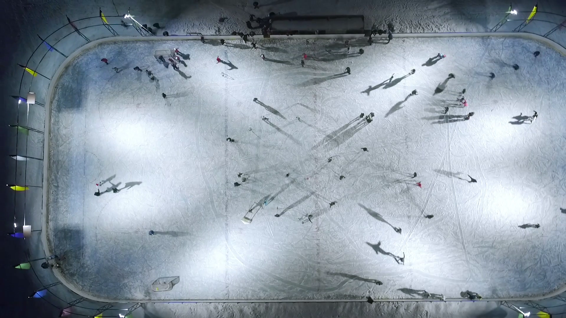 top view ice rink with skating people Stock Video Footage - Videoblocks