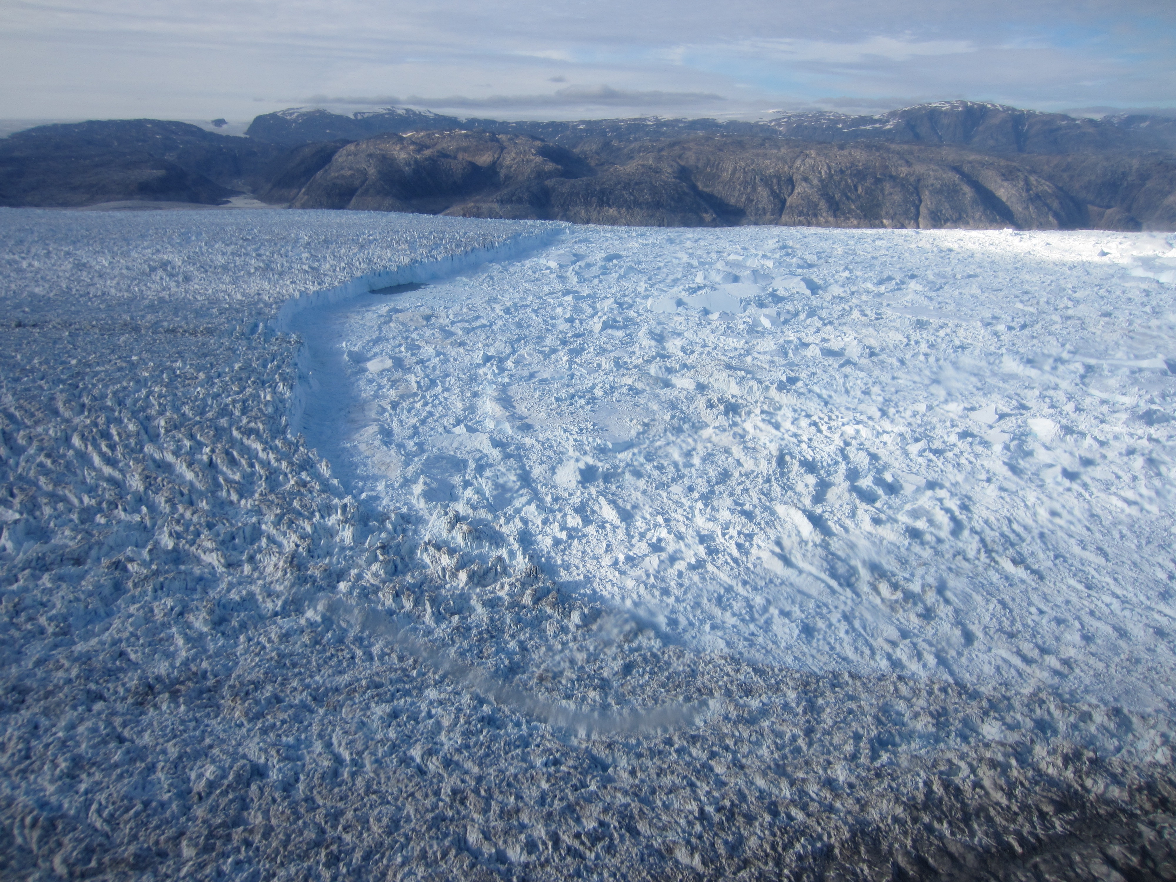 Most meltwater in Greenland fjords likely comes from icebergs, not ...