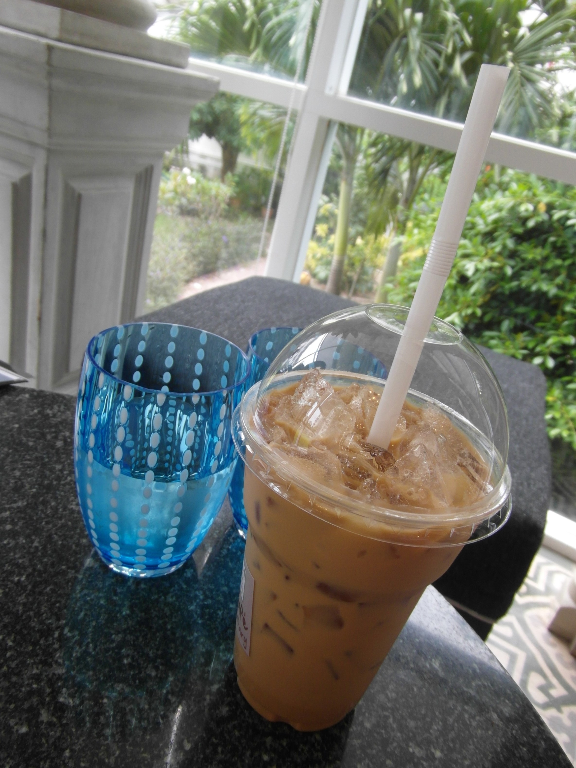 Iced latte and water photo