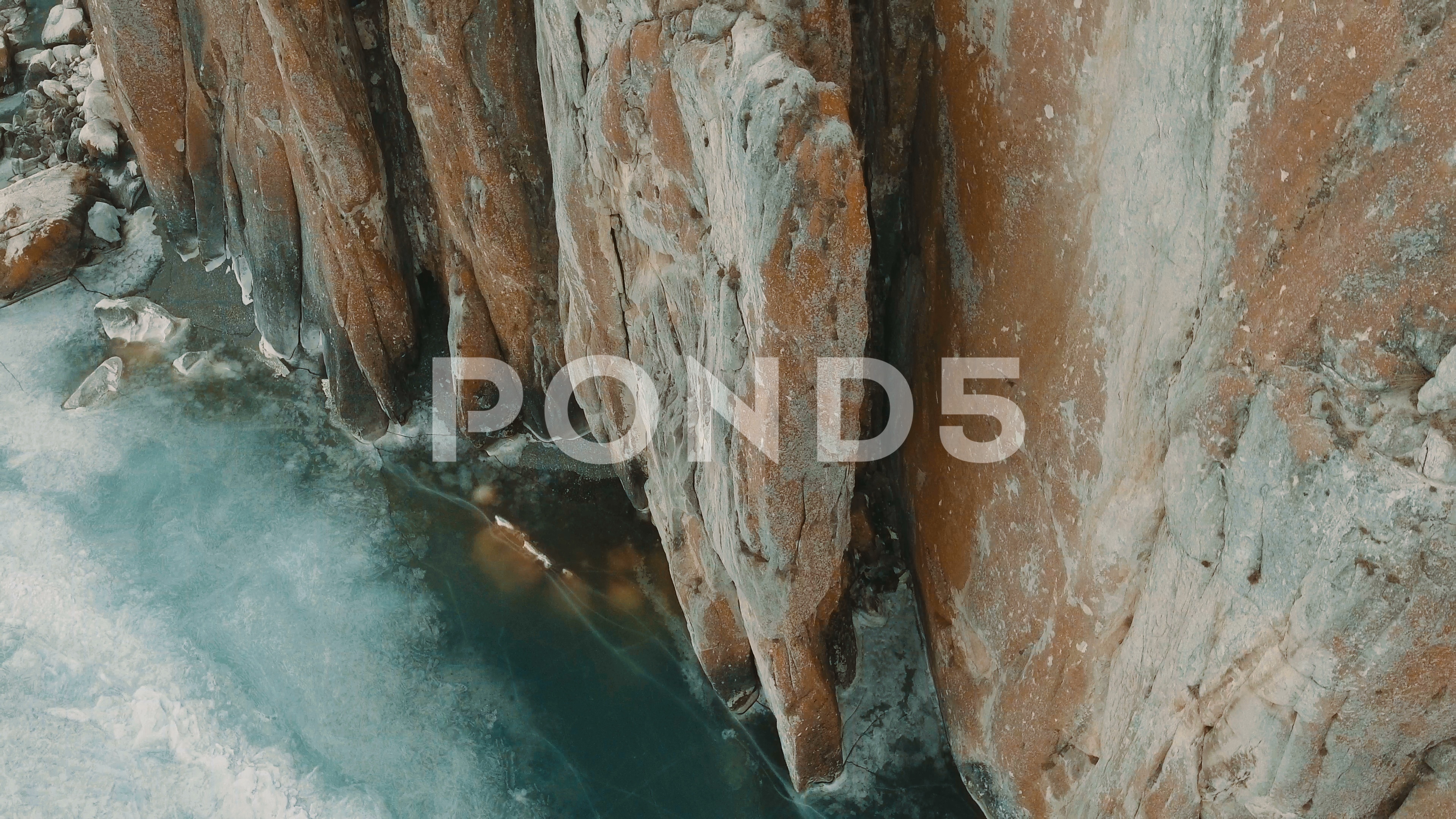 Video: Iced rocks winter landscape aerial view ~ #78156984