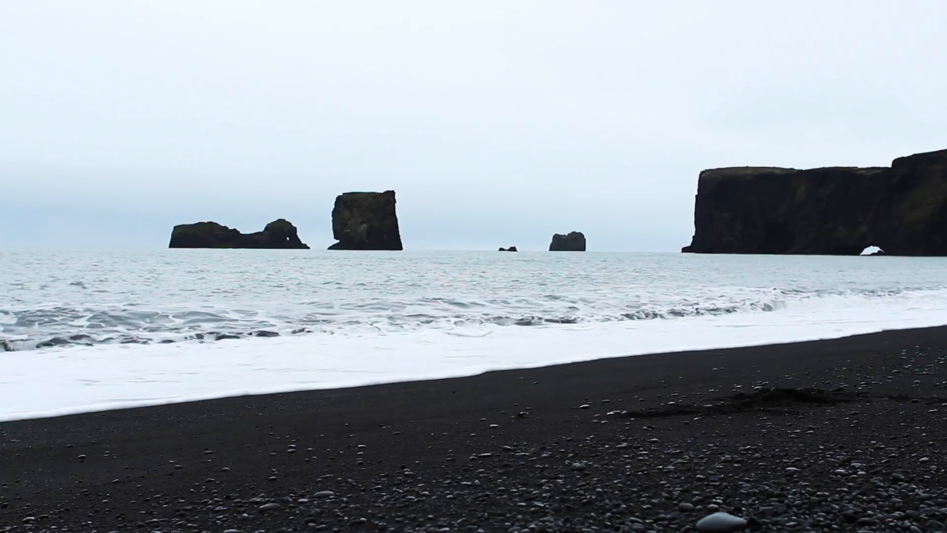 Dyrholaey Beach, Iceland volcanic black sand. Icelandic seascape ...
