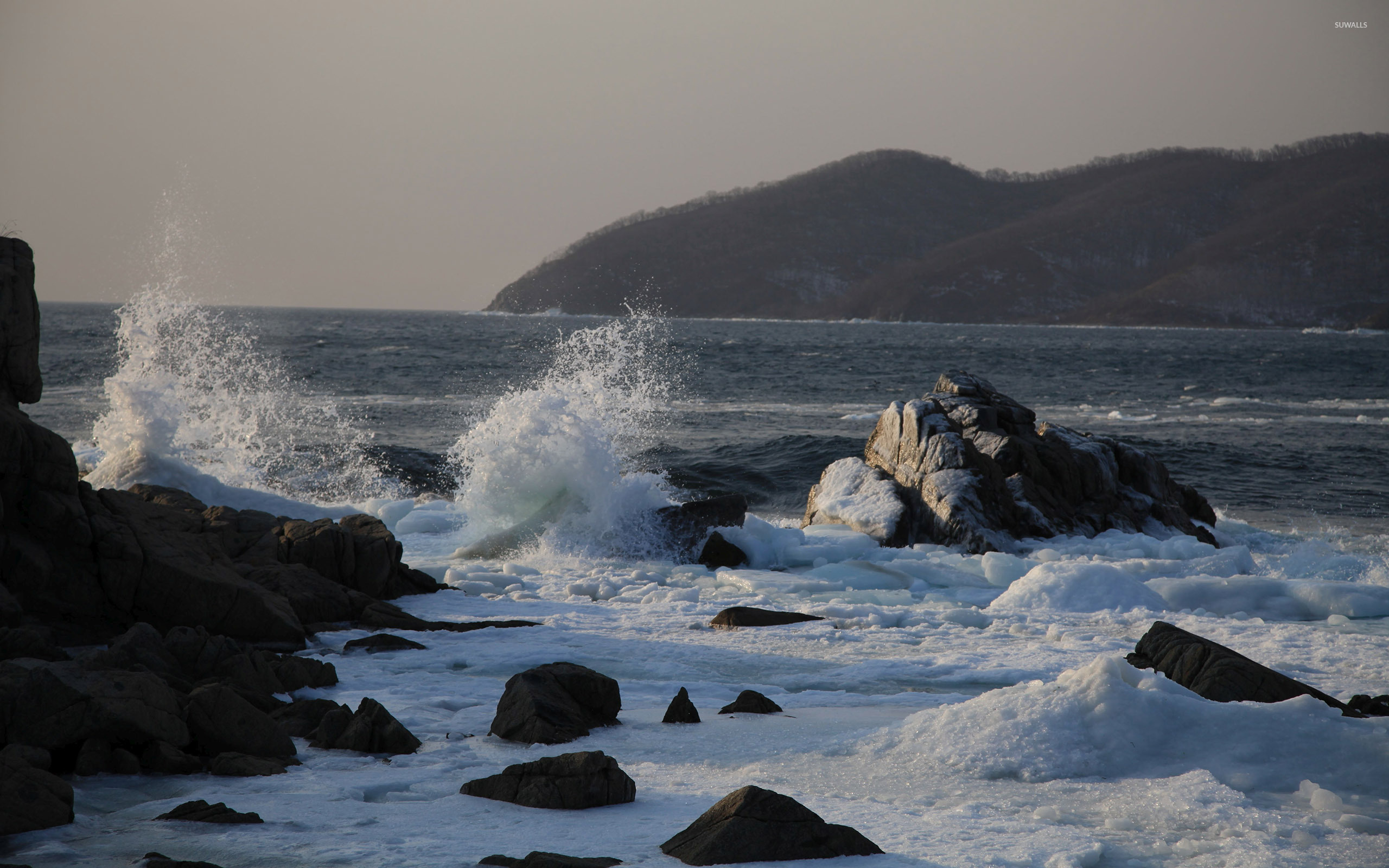 Waves splashing on the icy rocks wallpaper - Beach wallpapers - #37703