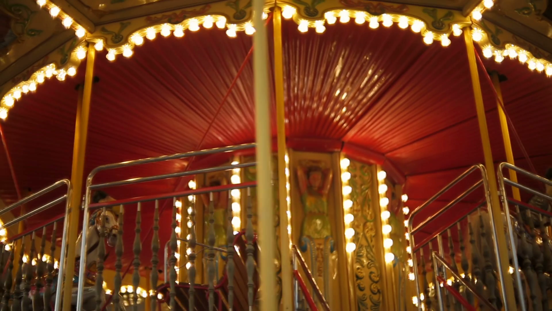 Beautiful illuminated carousel with marquee at night Stock Video ...