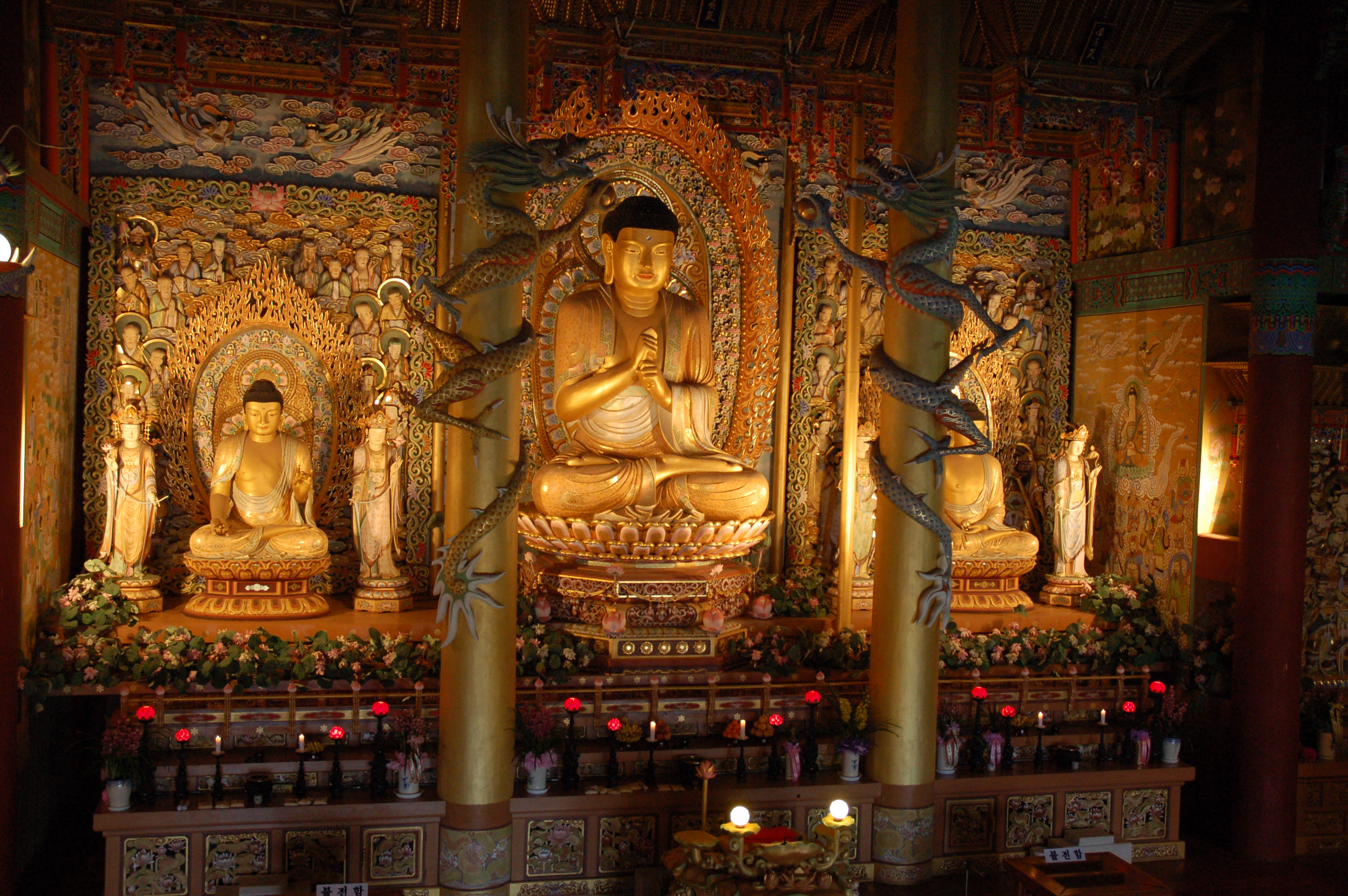 File:Buddha statues in a temple on Jejudo.jpg - Wikimedia Commons