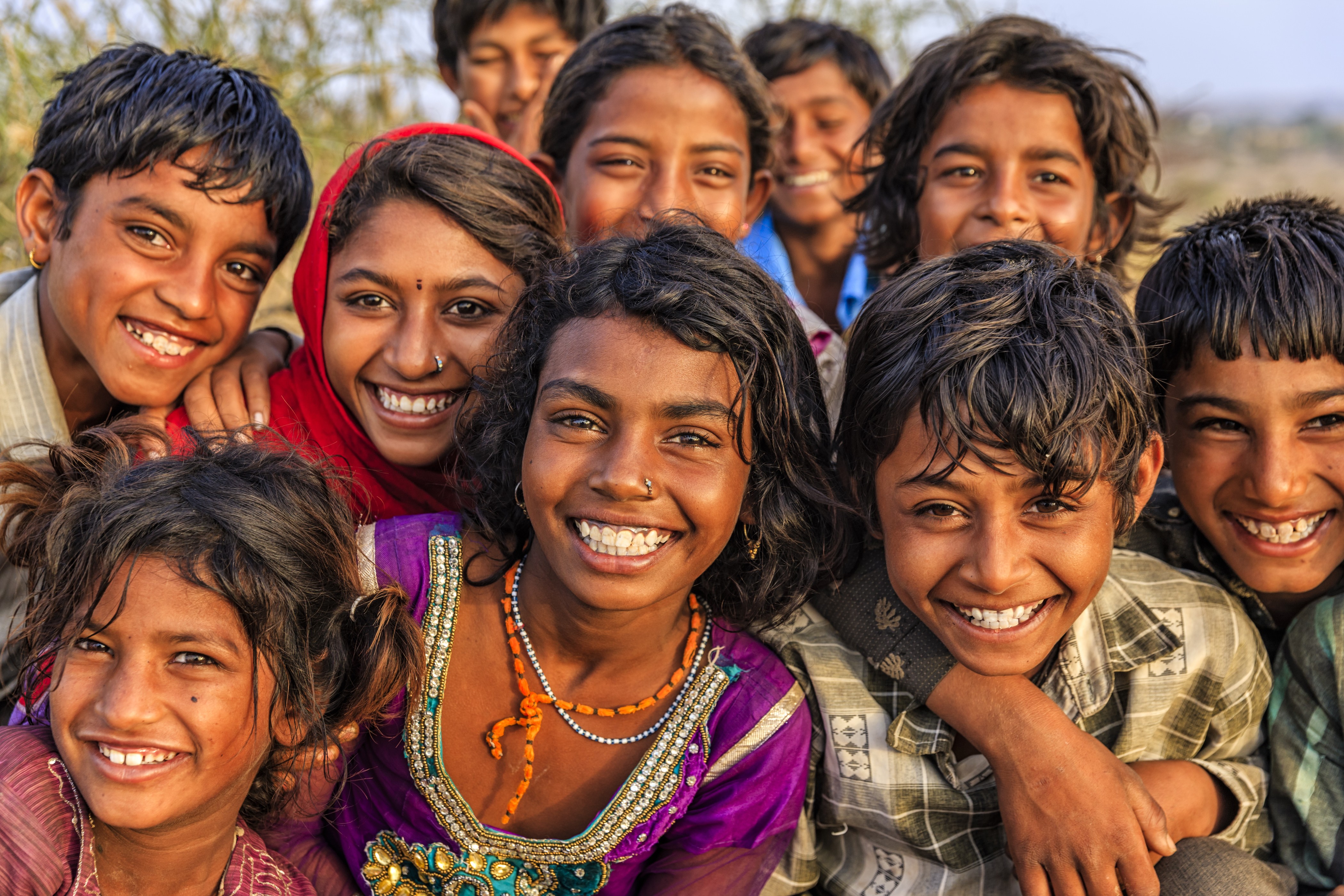 Group of happy Gypsy Indian children, desert village, India ...